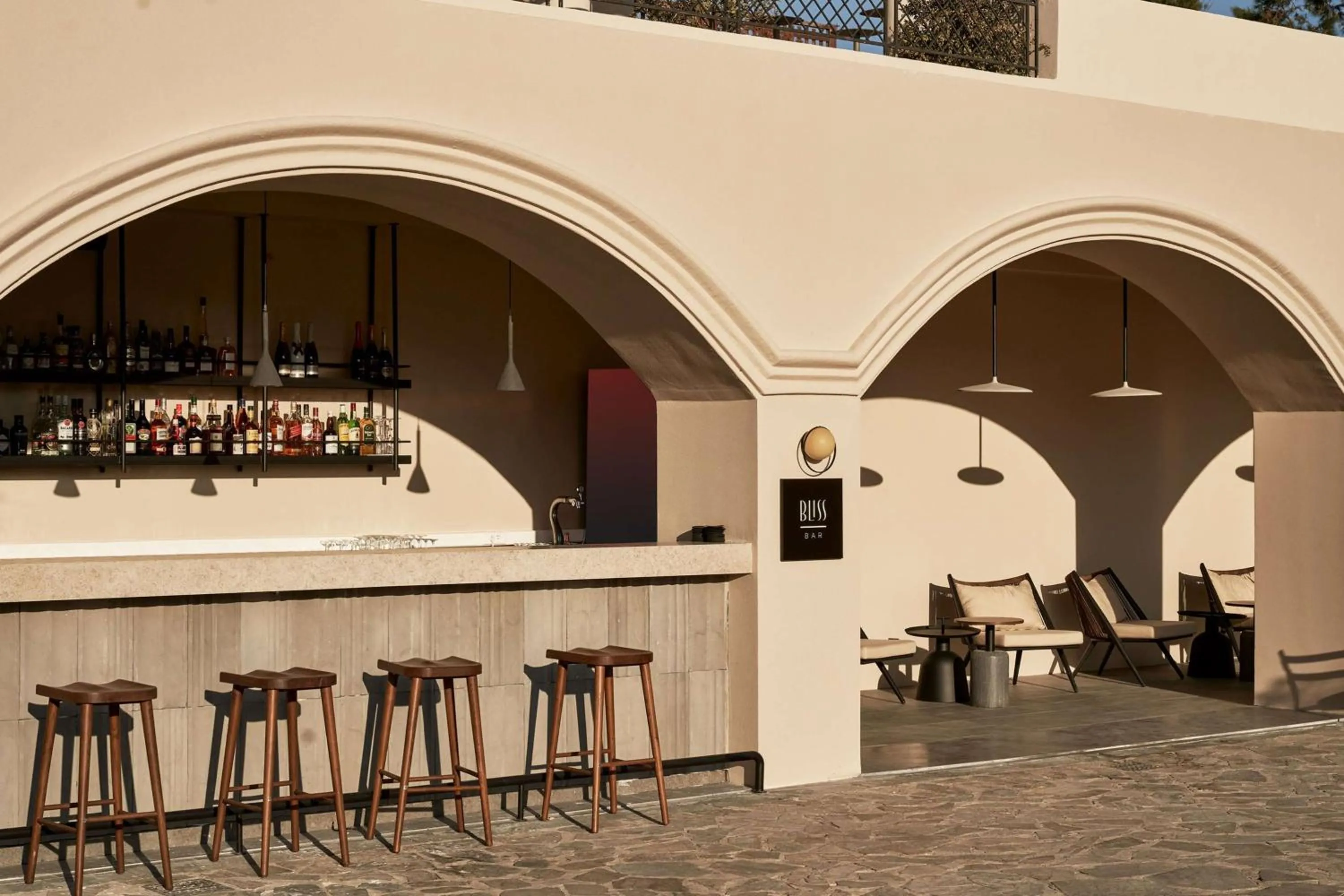 Lounge or bar in Aulūs Lindos Rhodes, Curio Collection by Hilton