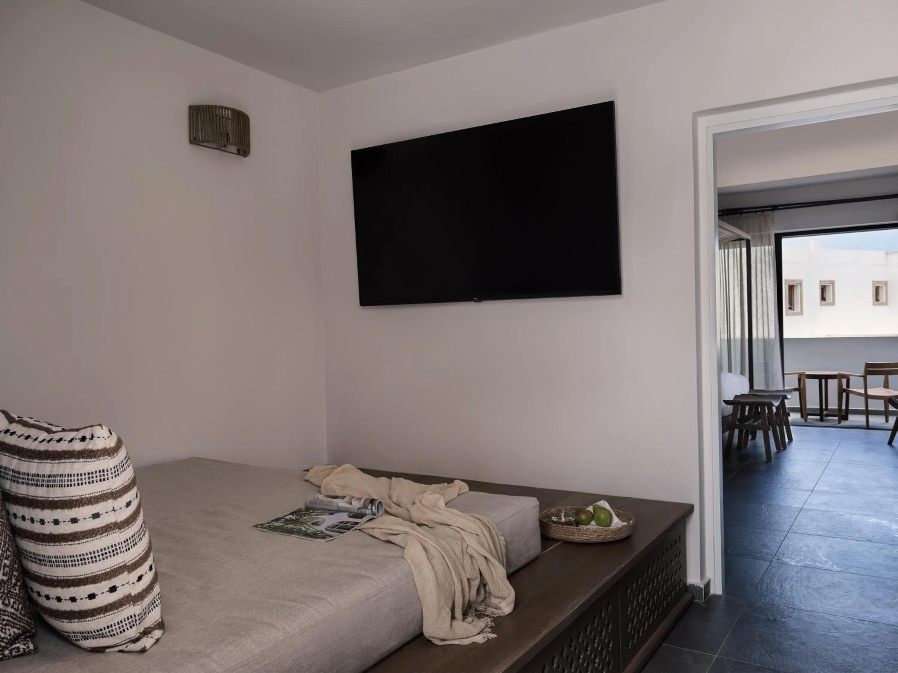 Bed in Aulūs Lindos Rhodes, Curio Collection by Hilton