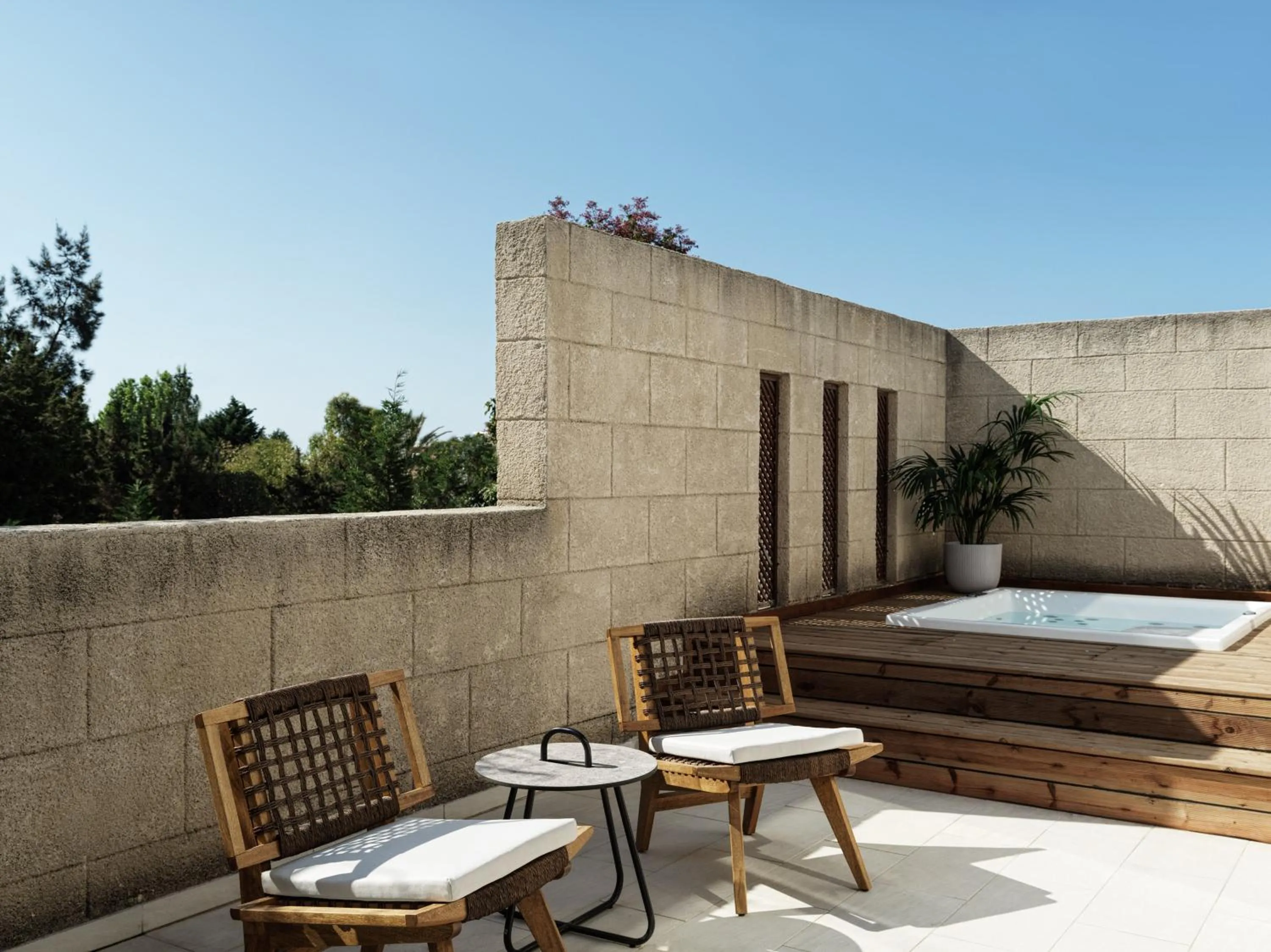 Patio in Aulūs Lindos Rhodes, Curio Collection by Hilton