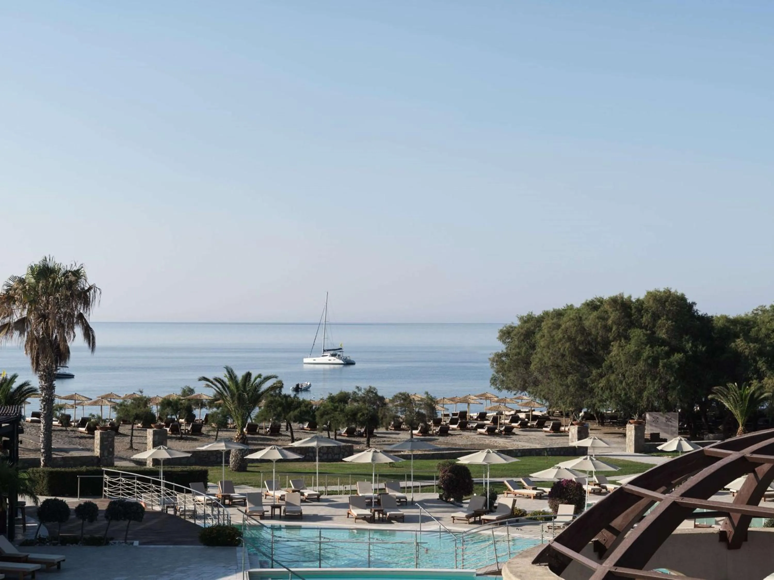 Pool view in Aulūs Lindos Rhodes, Curio Collection by Hilton