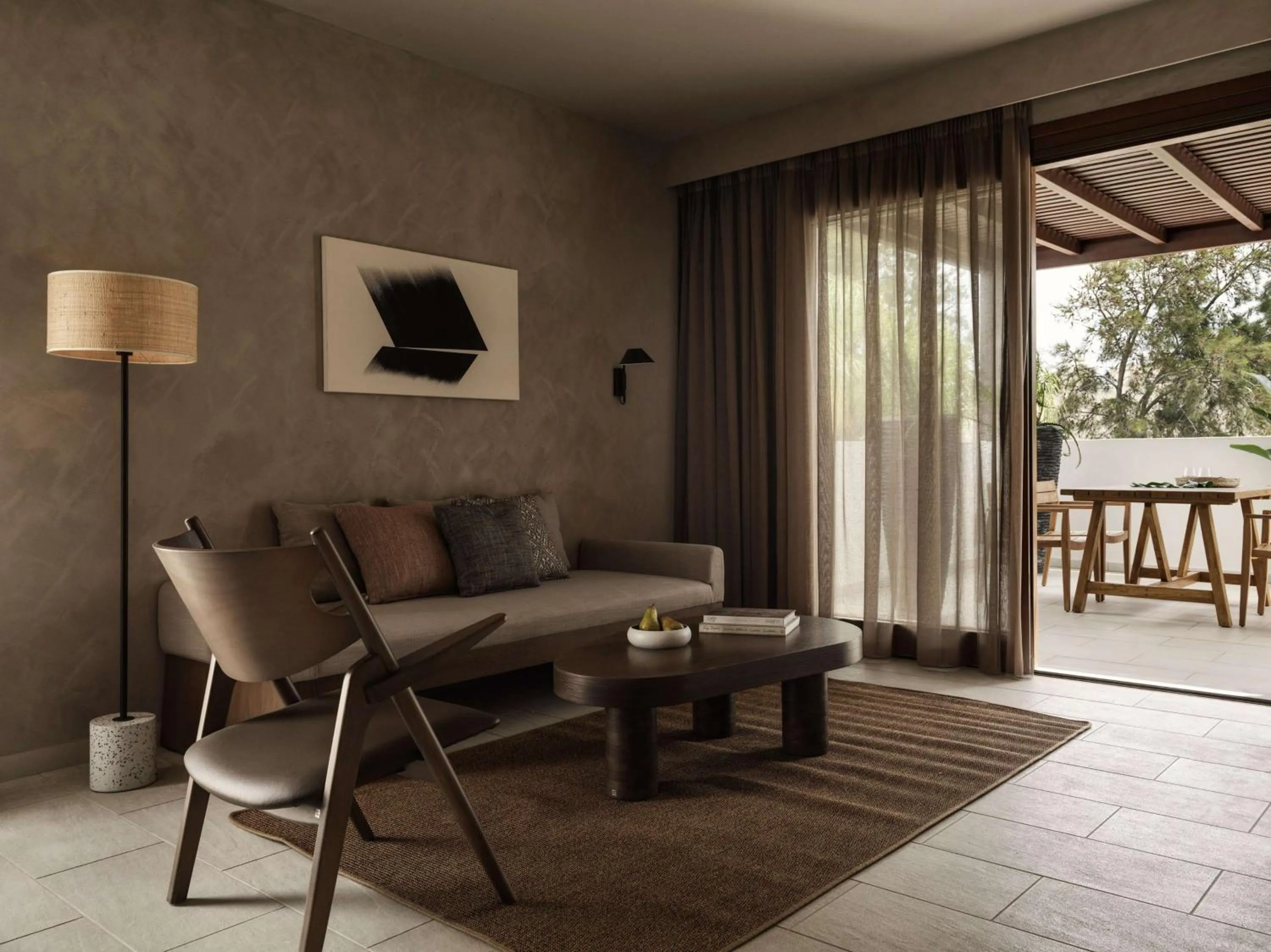 Living room in Aulūs Lindos Rhodes, Curio Collection by Hilton