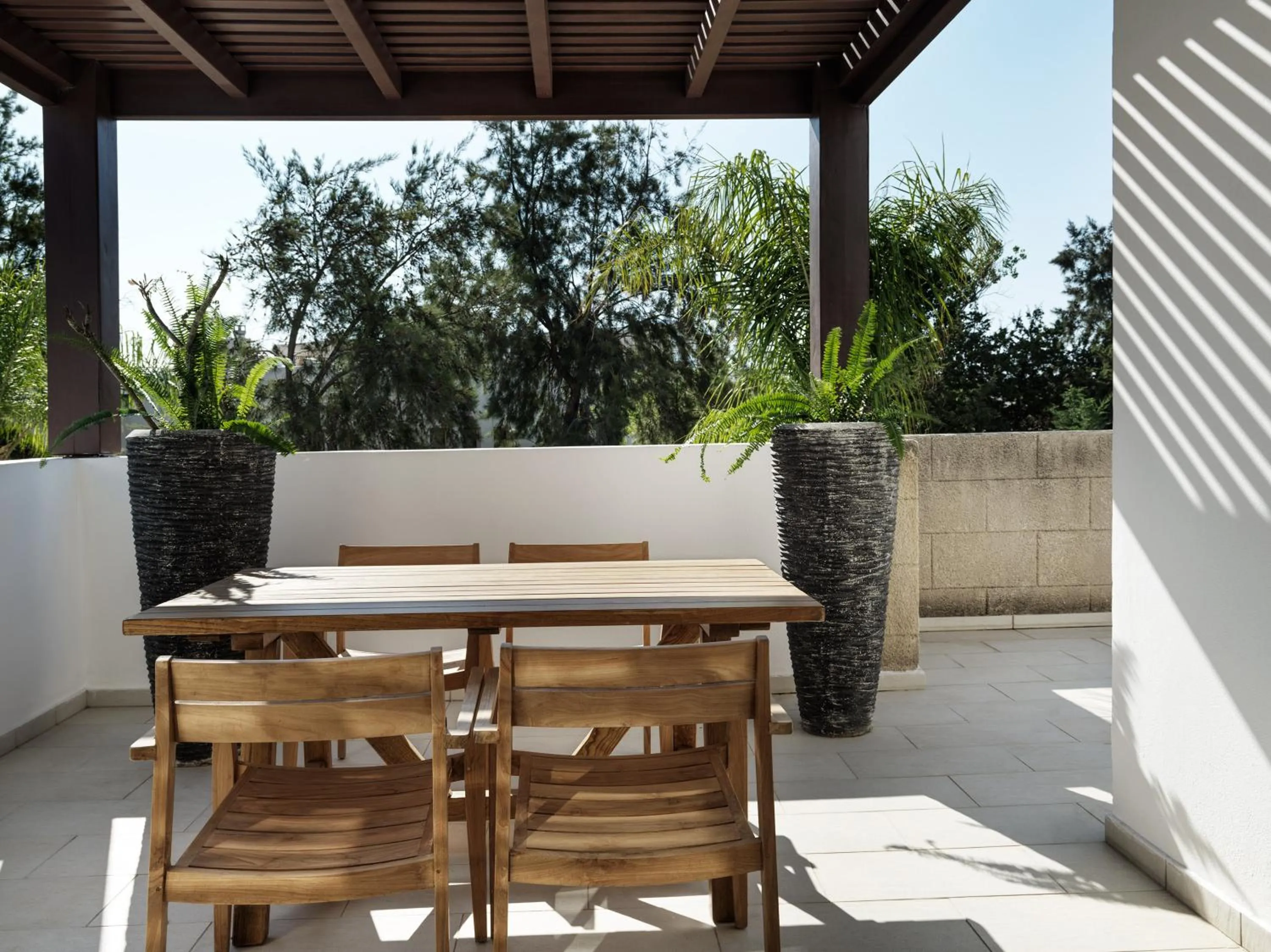 Patio in Aulūs Lindos Rhodes, Curio Collection by Hilton