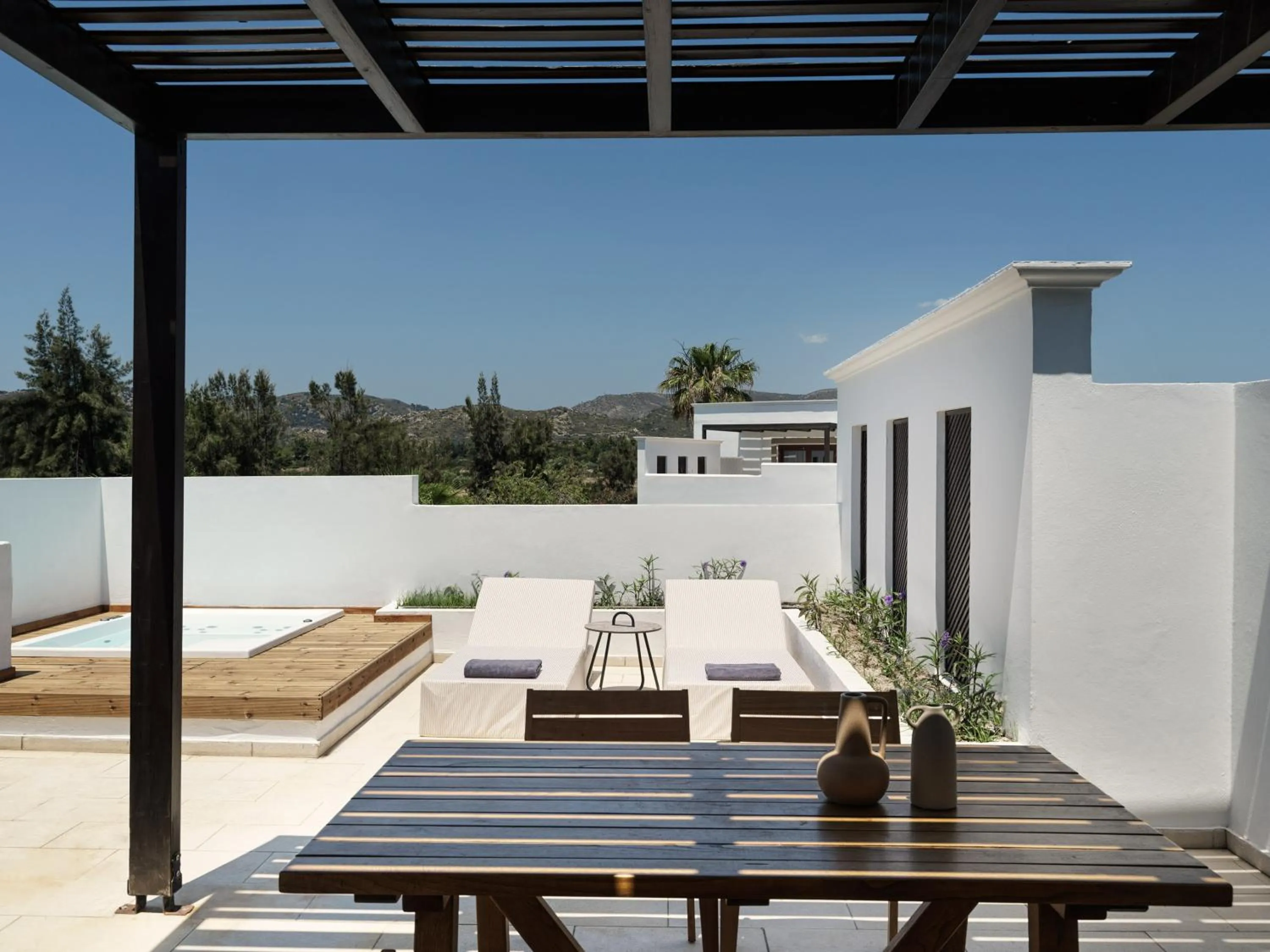 Patio in Aulūs Lindos Rhodes, Curio Collection by Hilton