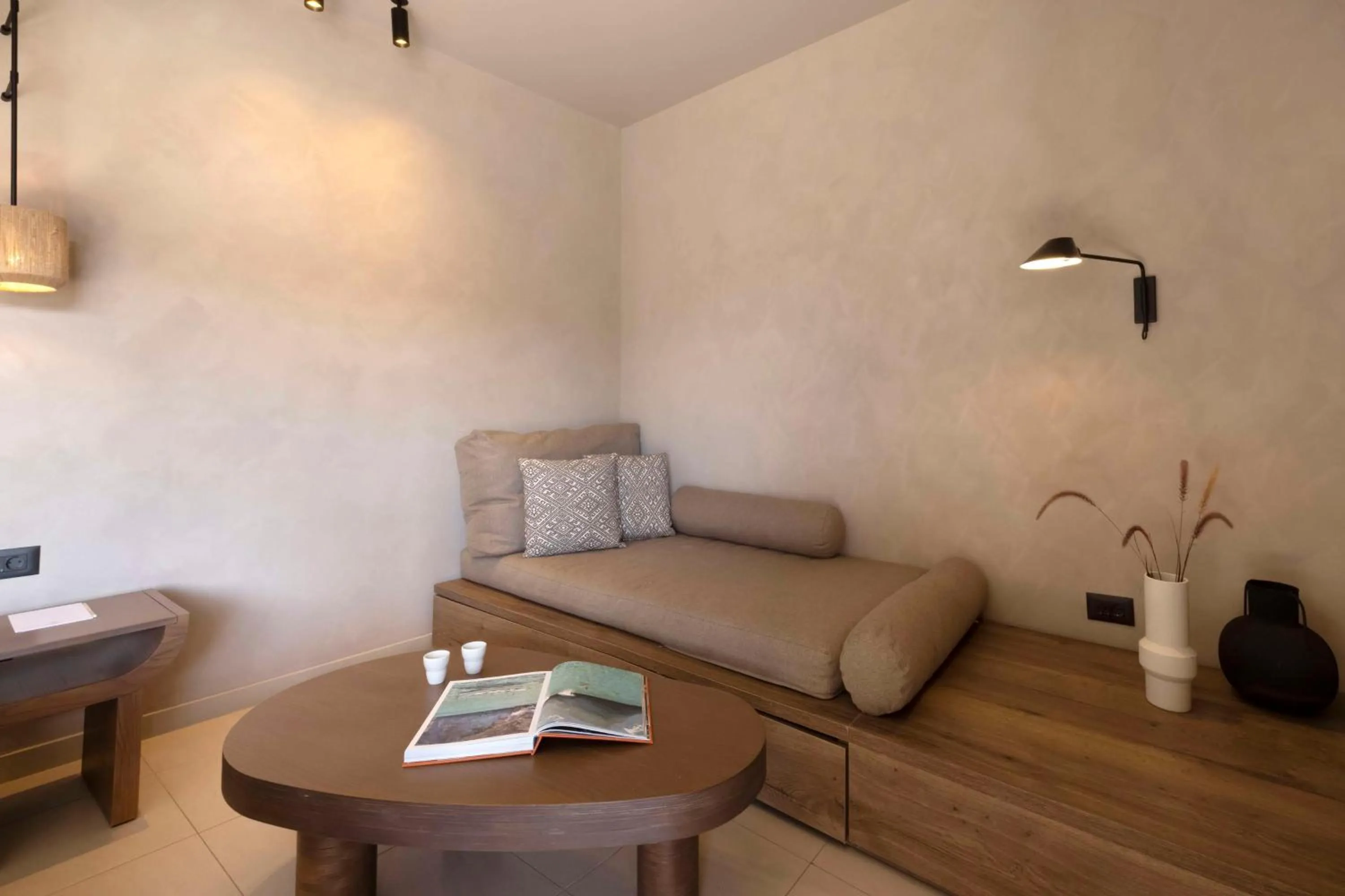 Living room in Aulūs Lindos Rhodes, Curio Collection by Hilton