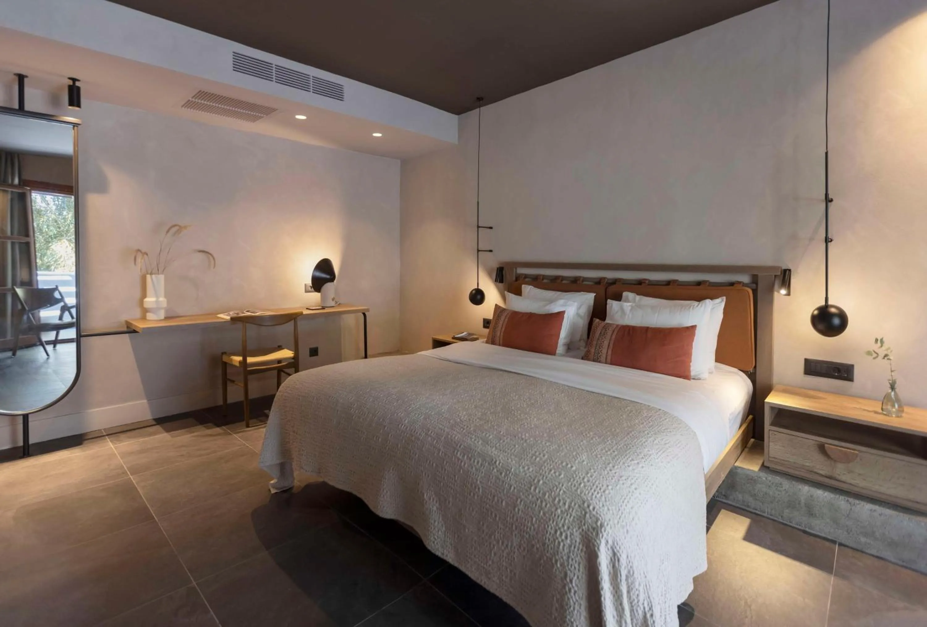 Bed in Aulūs Lindos Rhodes, Curio Collection by Hilton