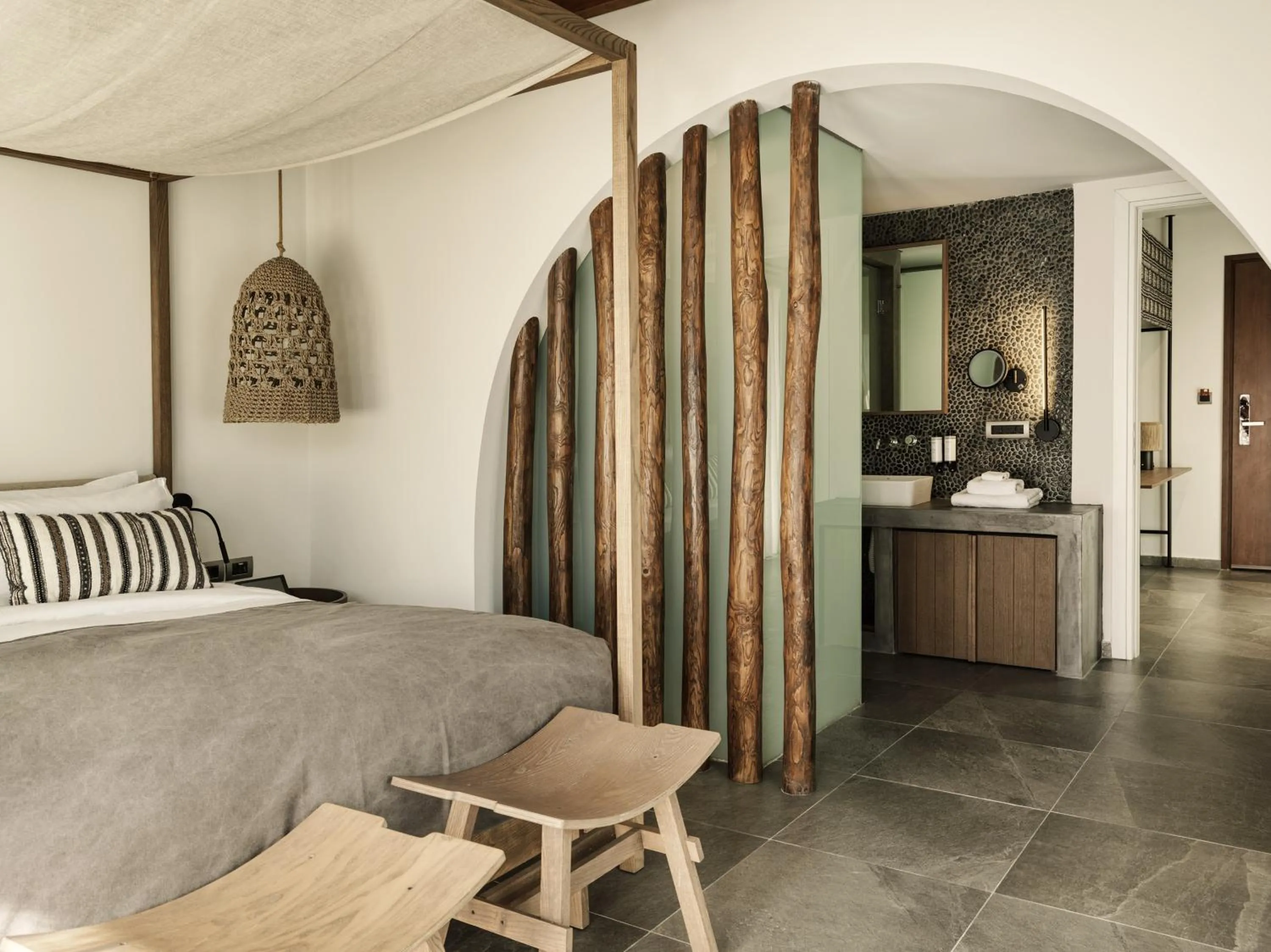 Bed in Aulūs Lindos Rhodes, Curio Collection by Hilton