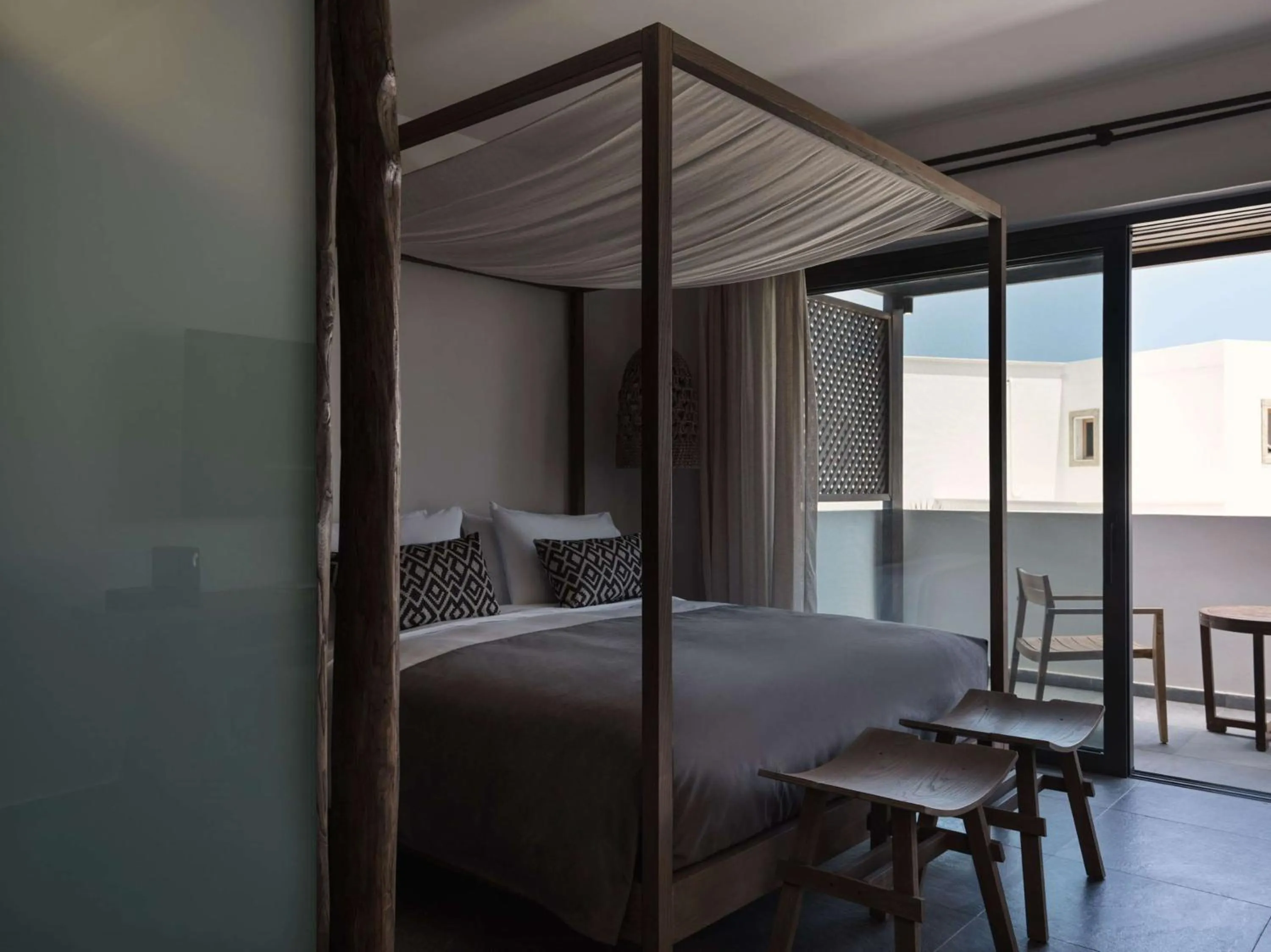 Bed in Aulūs Lindos Rhodes, Curio Collection by Hilton