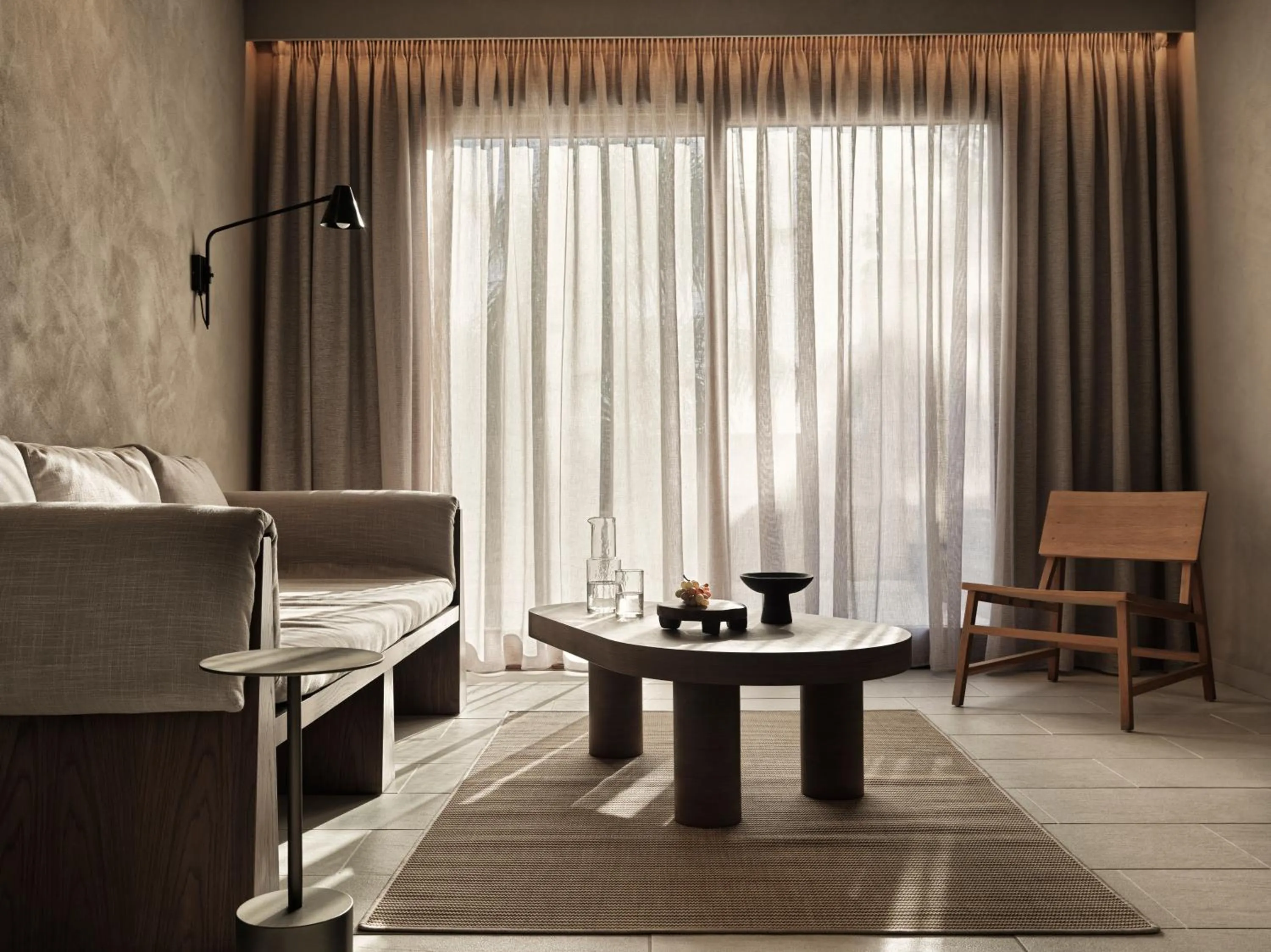 Living room in Aulūs Lindos Rhodes, Curio Collection by Hilton