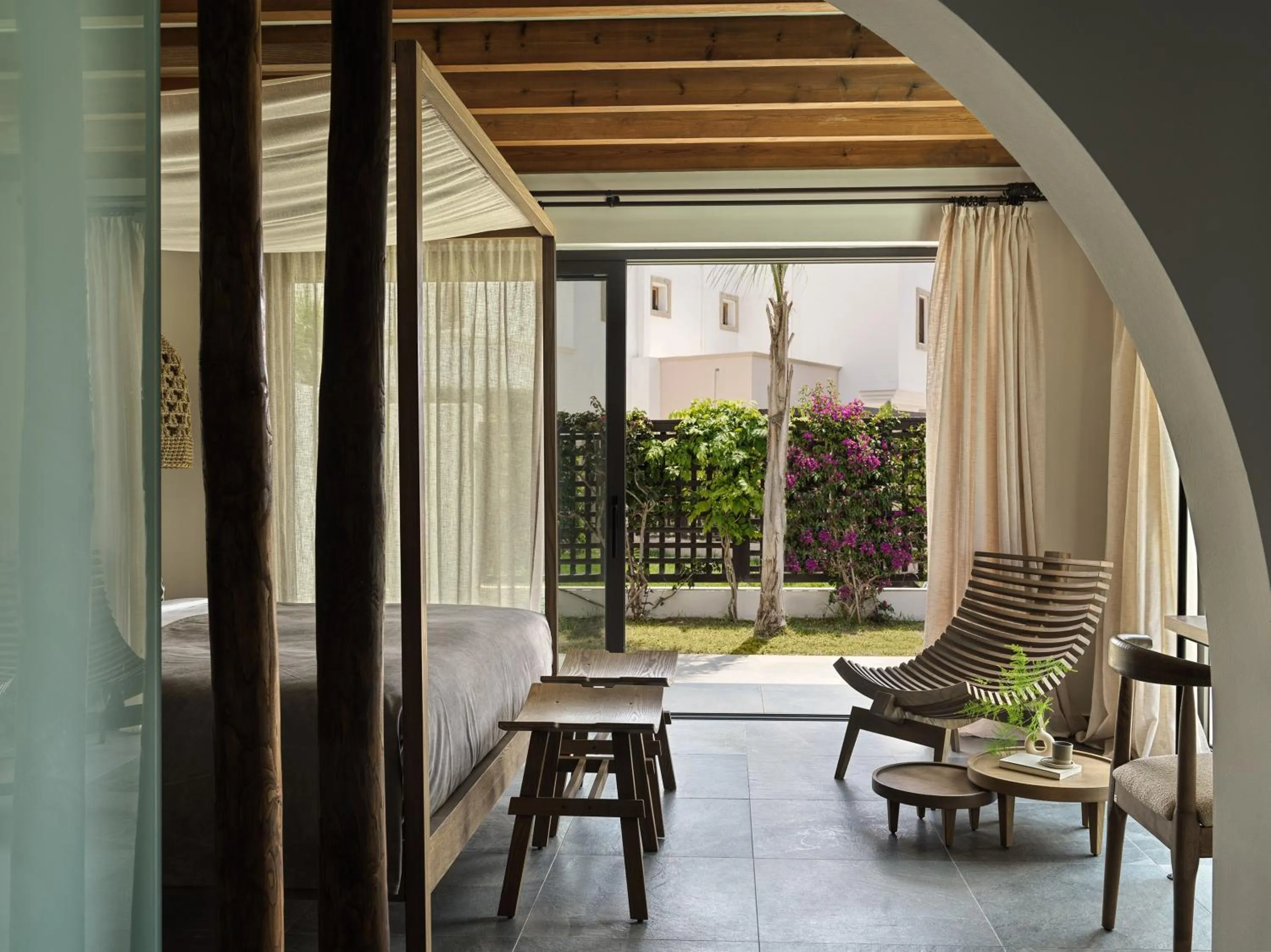 Bed in Aulūs Lindos Rhodes, Curio Collection by Hilton