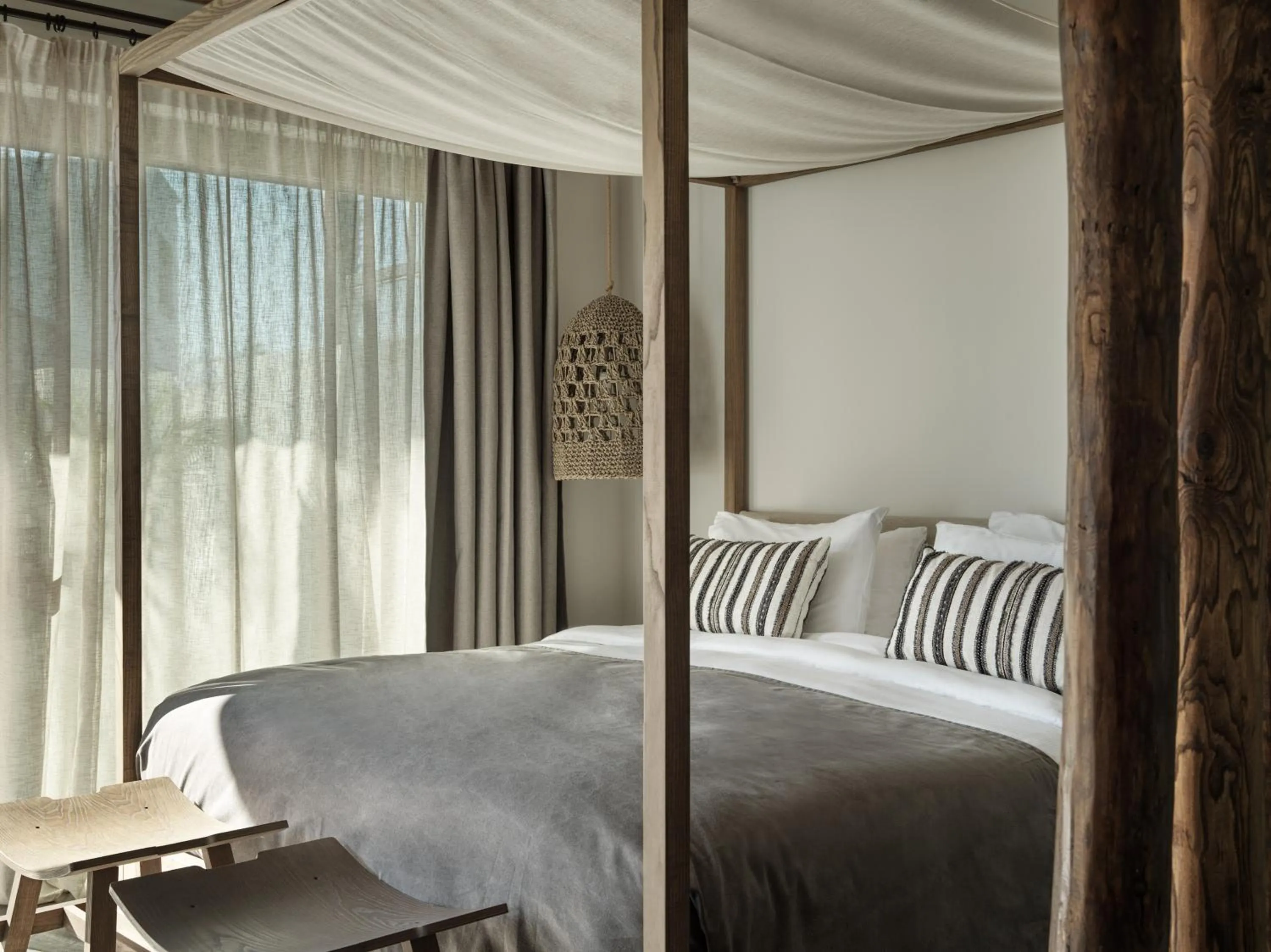 Bed in Aulūs Lindos Rhodes, Curio Collection by Hilton