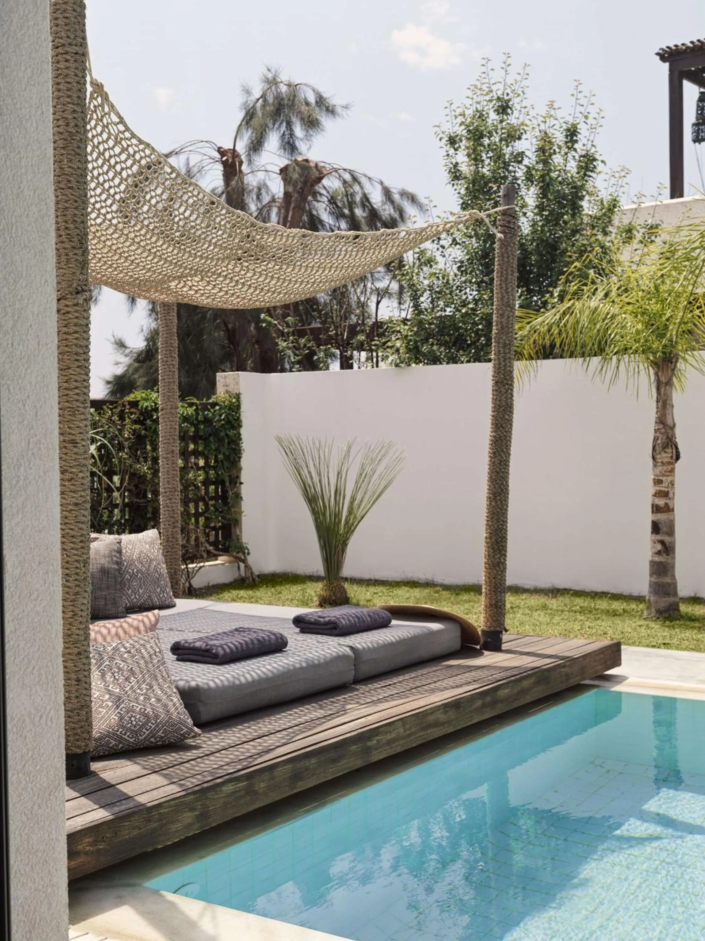 Living room in Aulūs Lindos Rhodes, Curio Collection by Hilton