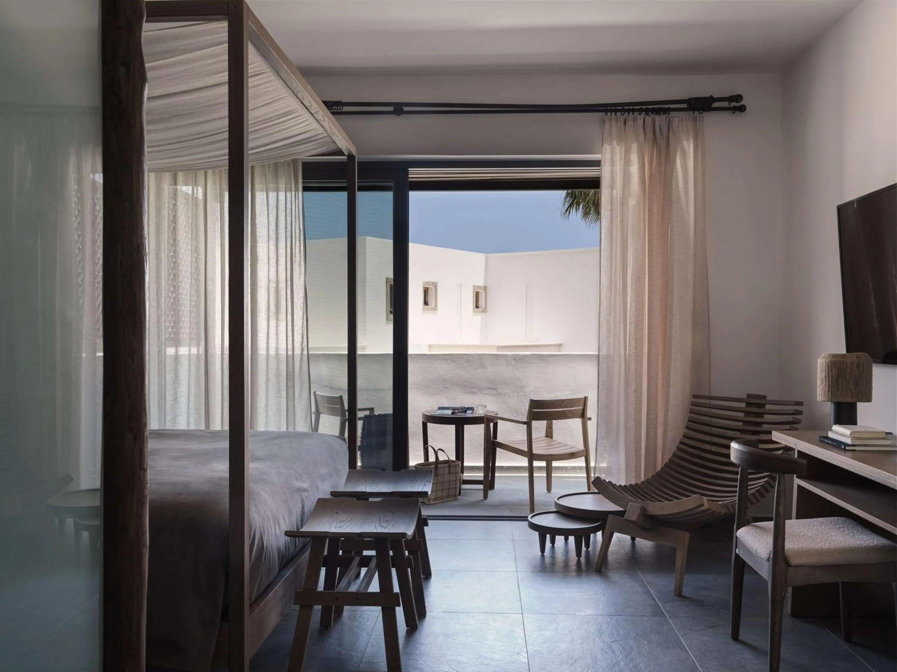 Living room in Aulūs Lindos Rhodes, Curio Collection by Hilton