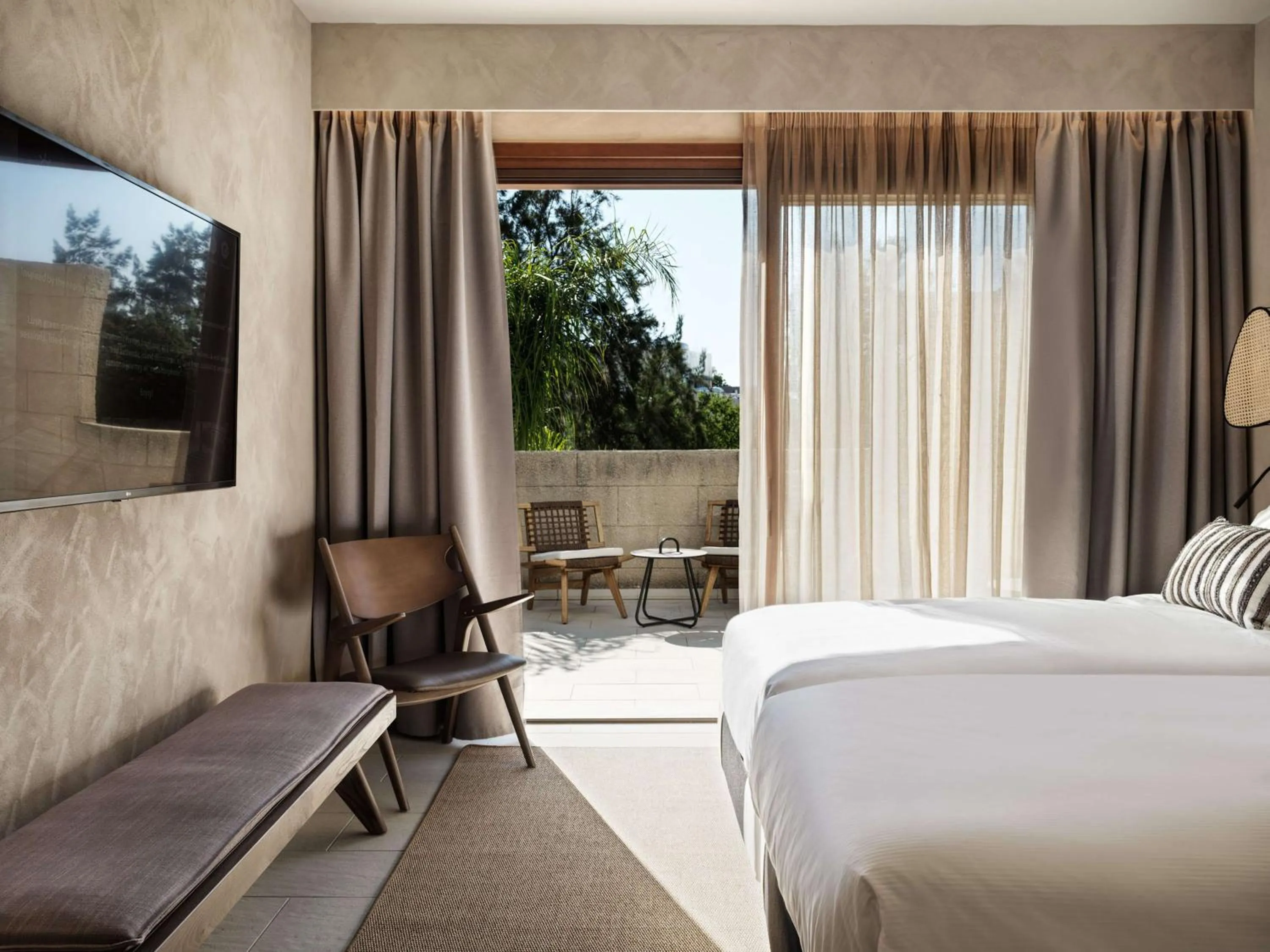 Bed in Aulūs Lindos Rhodes, Curio Collection by Hilton