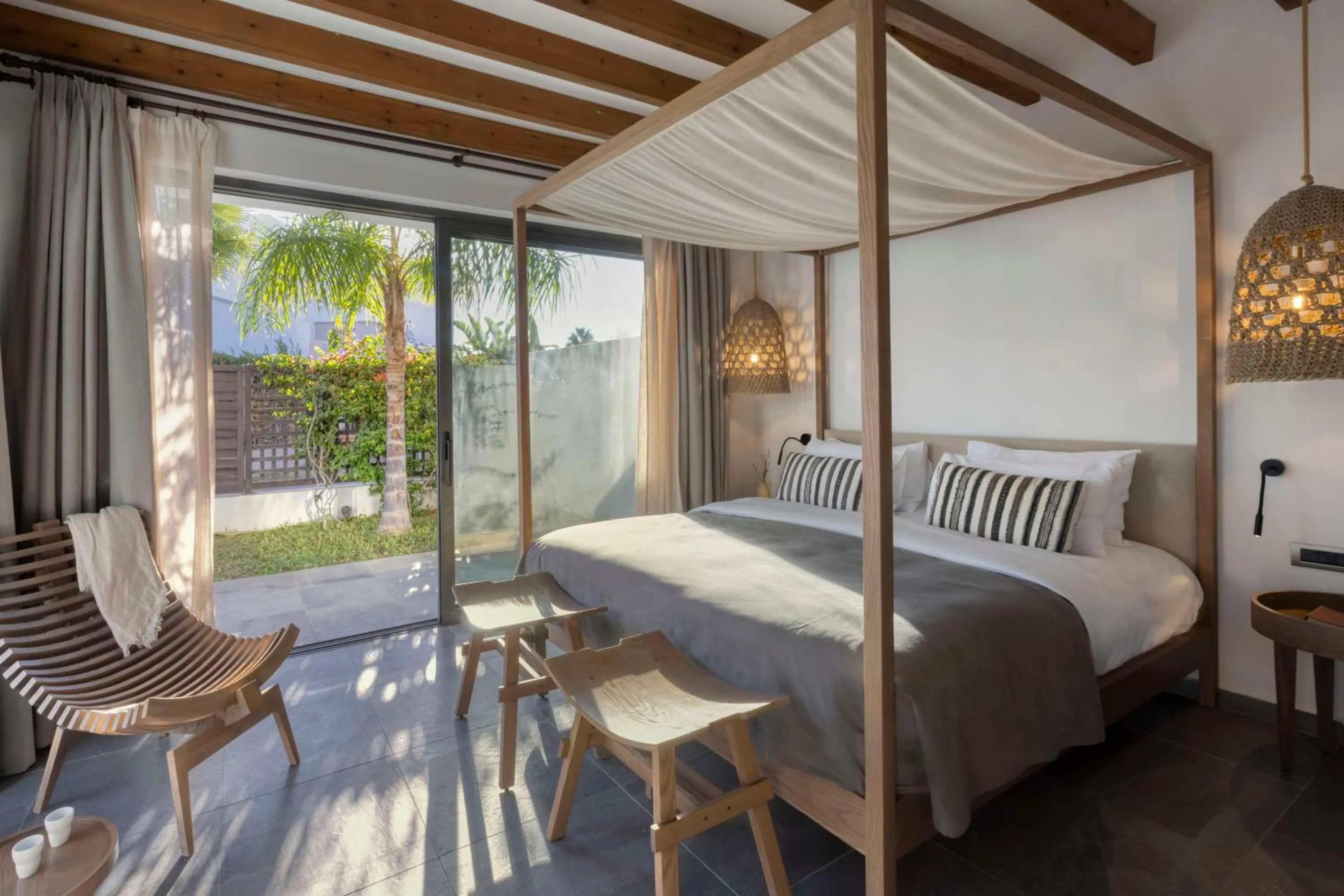 Bed in Aulūs Lindos Rhodes, Curio Collection by Hilton