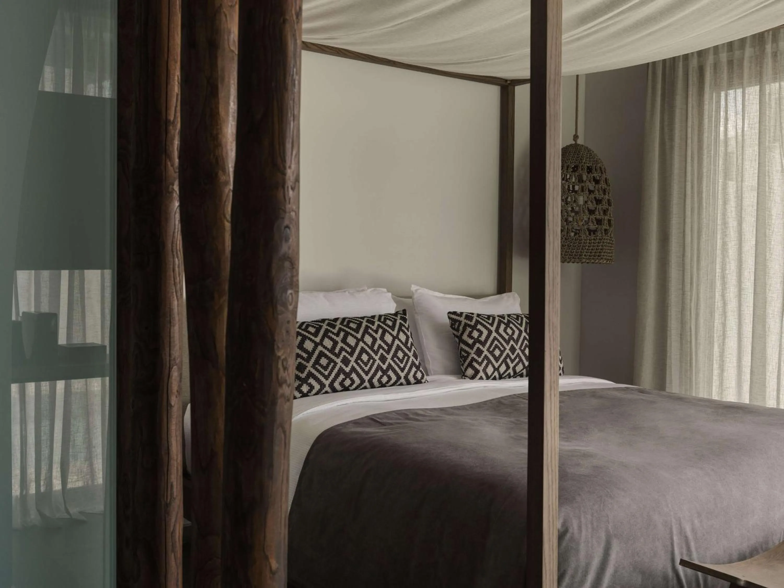 Bed in Aulūs Lindos Rhodes, Curio Collection by Hilton