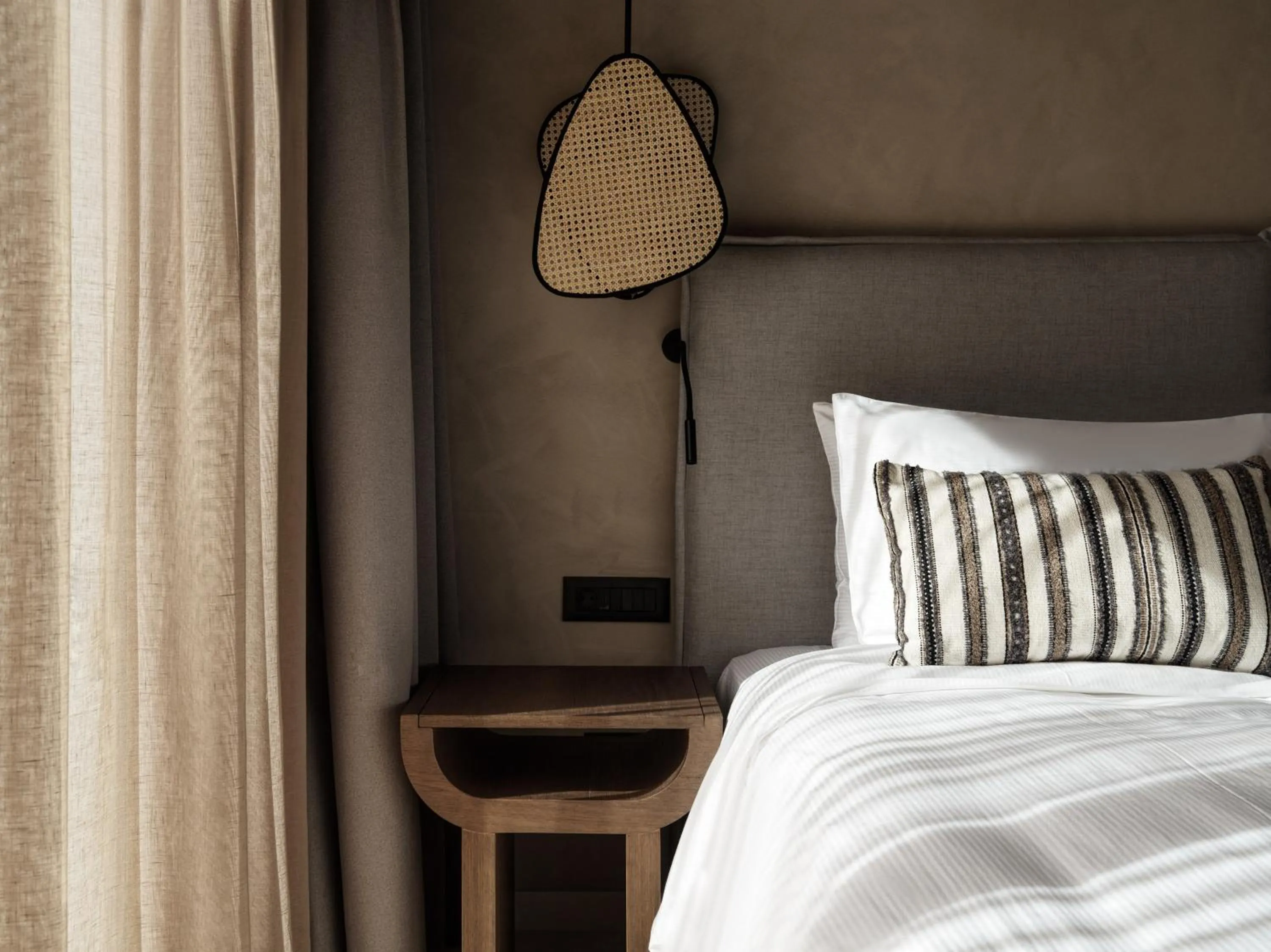 Bed in Aulūs Lindos Rhodes, Curio Collection by Hilton