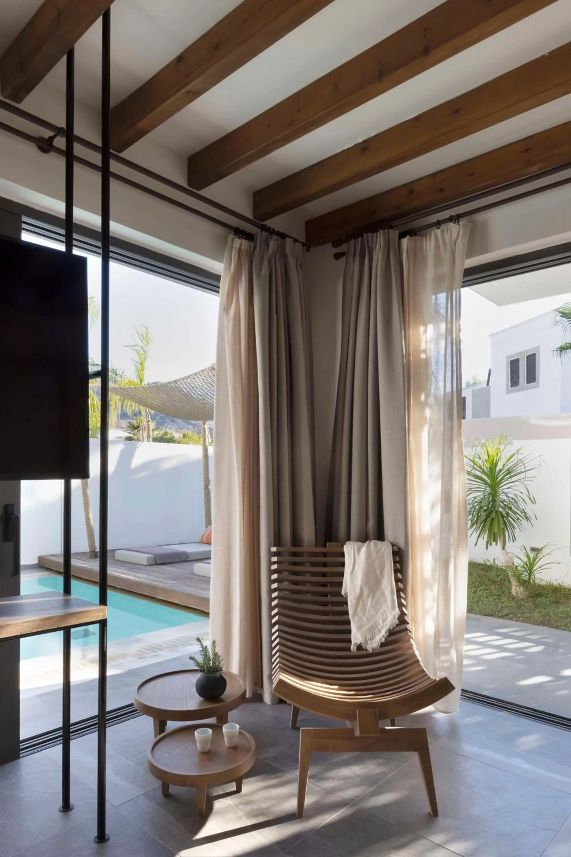 Living room in Aulūs Lindos Rhodes, Curio Collection by Hilton
