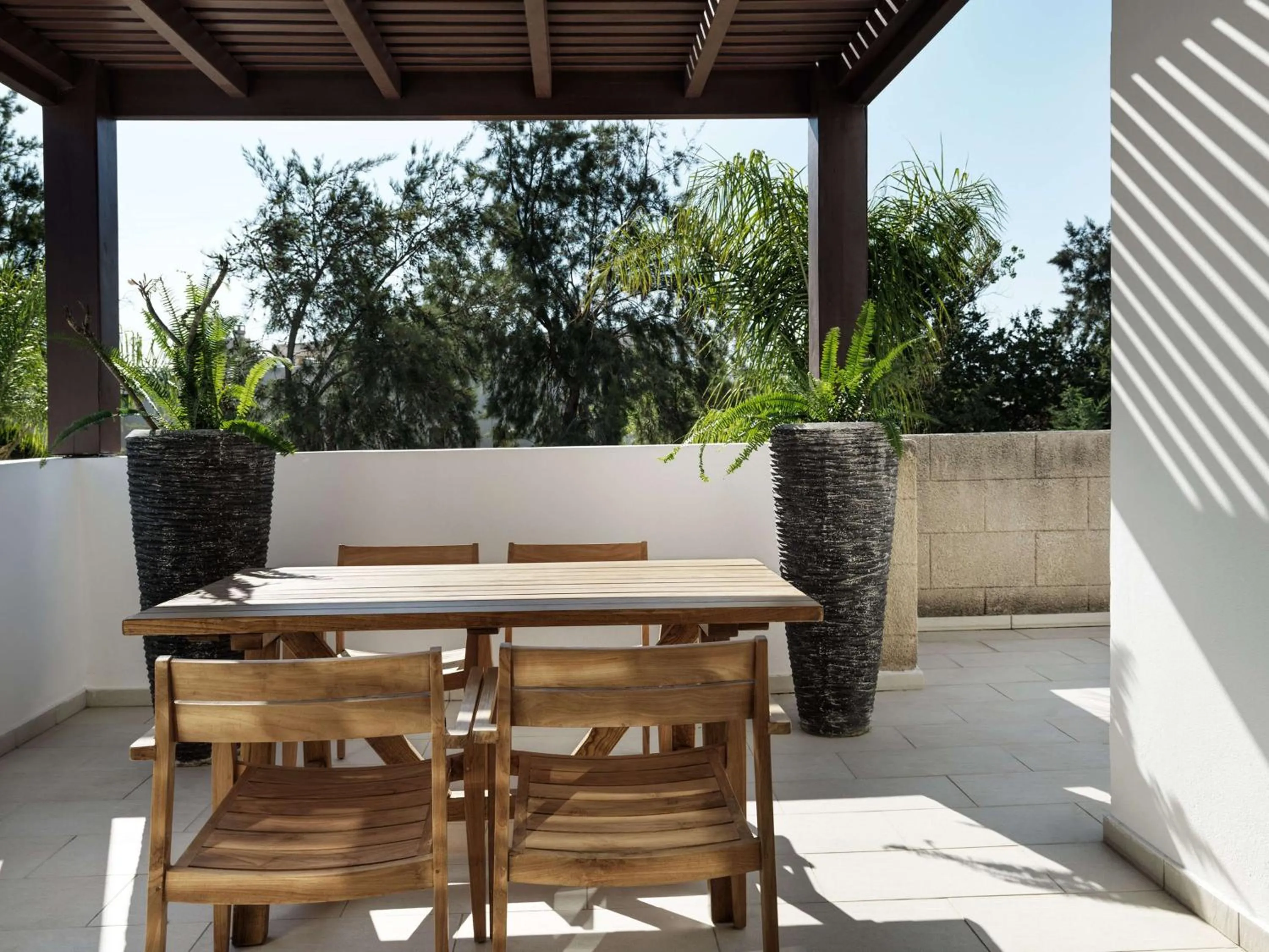 Living room in Aulūs Lindos Rhodes, Curio Collection by Hilton