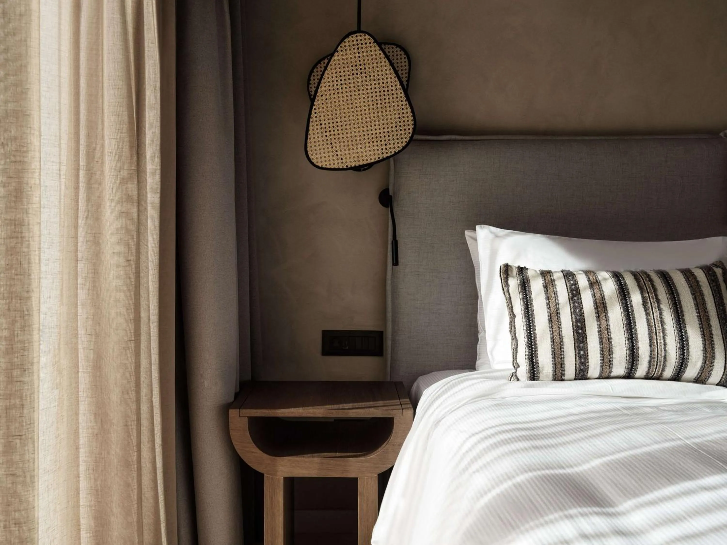 Bed in Aulūs Lindos Rhodes, Curio Collection by Hilton