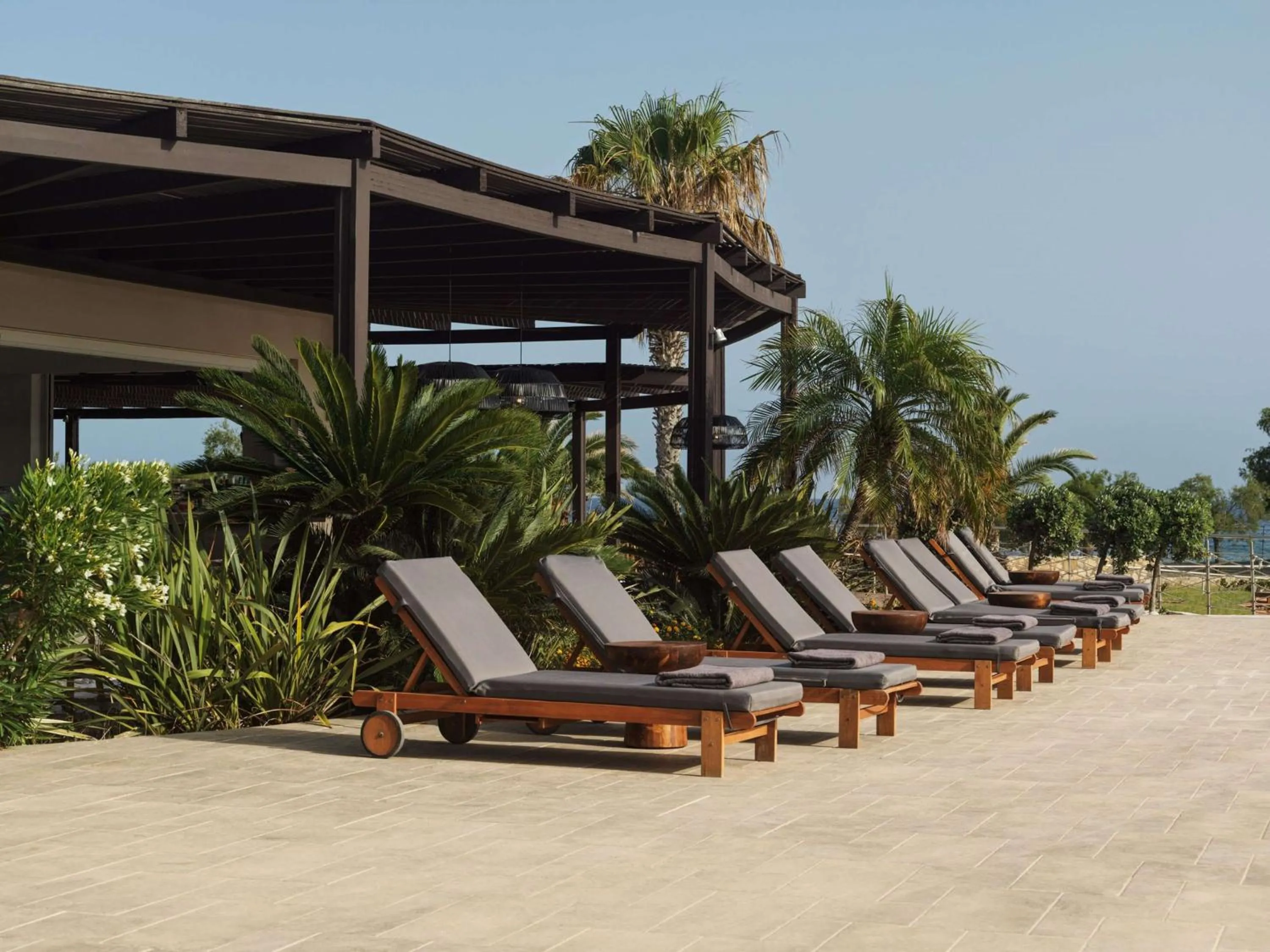 Pool view in Aulūs Lindos Rhodes, Curio Collection by Hilton