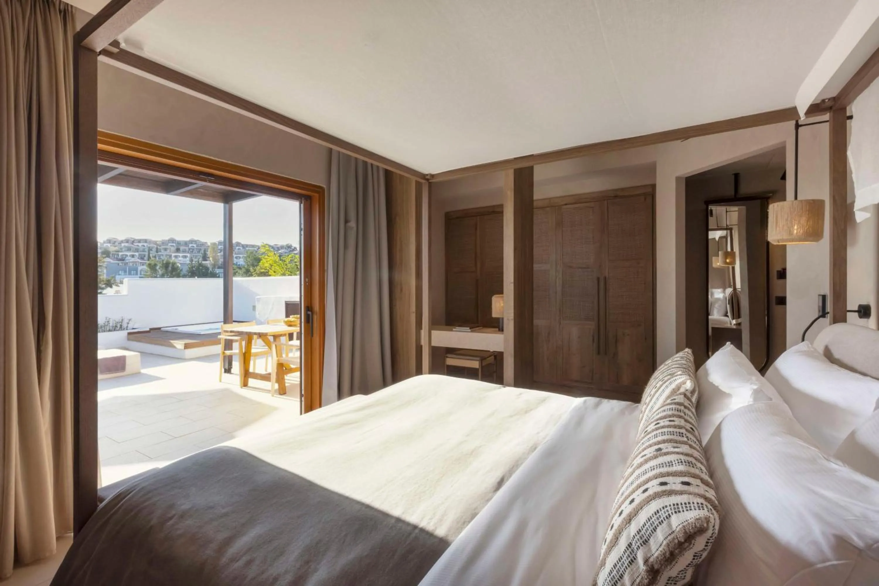 Bed in Aulūs Lindos Rhodes, Curio Collection by Hilton