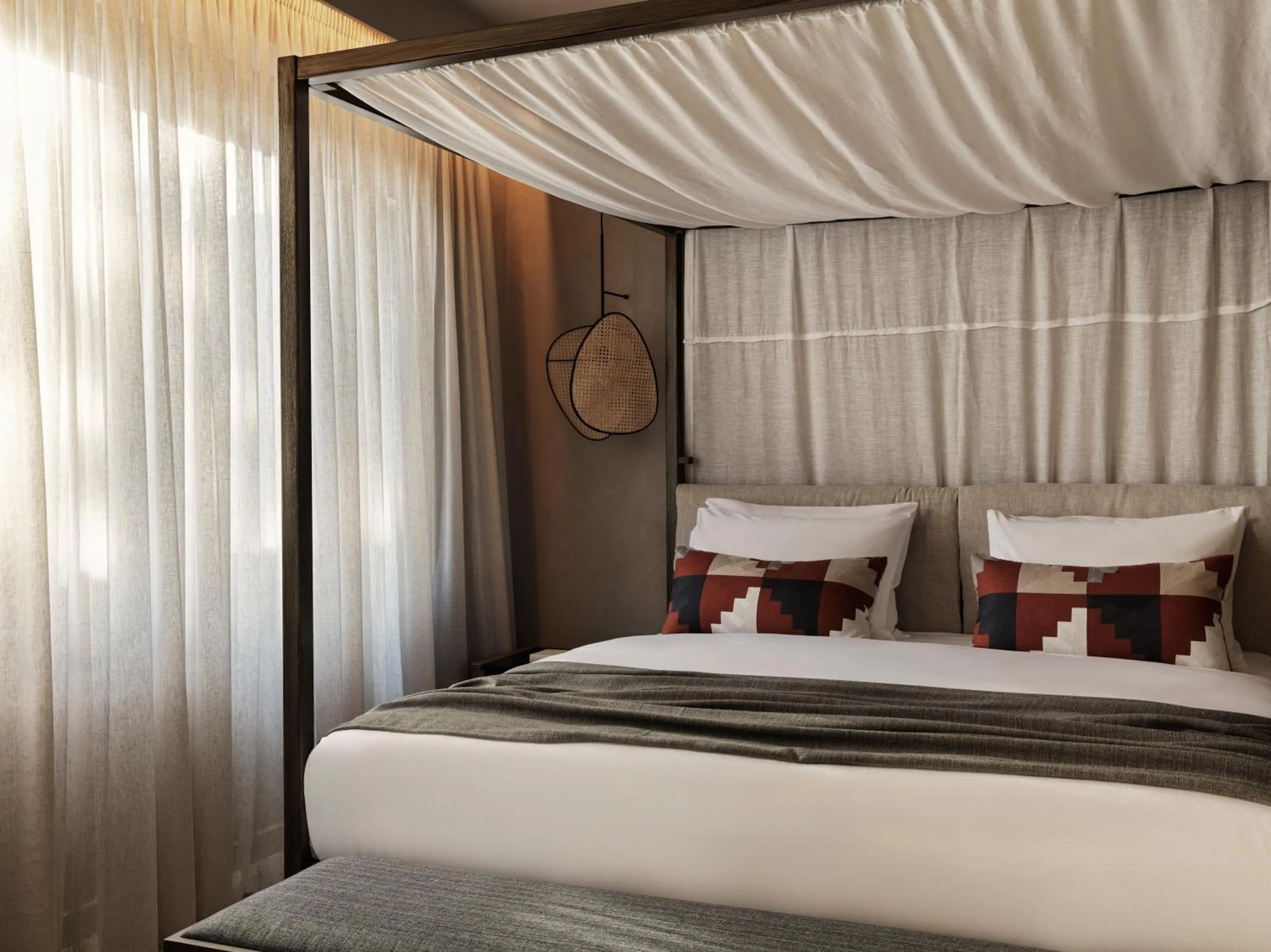 Bed in Aulūs Lindos Rhodes, Curio Collection by Hilton