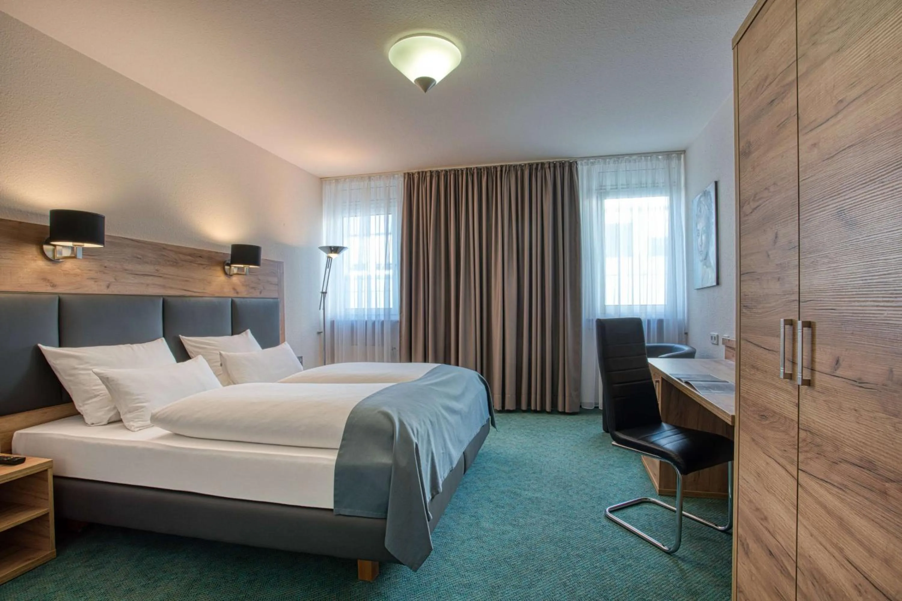 Photo of the whole room, Bed in Centro Hotel Böblingen, Trademark Collection by Wyndham