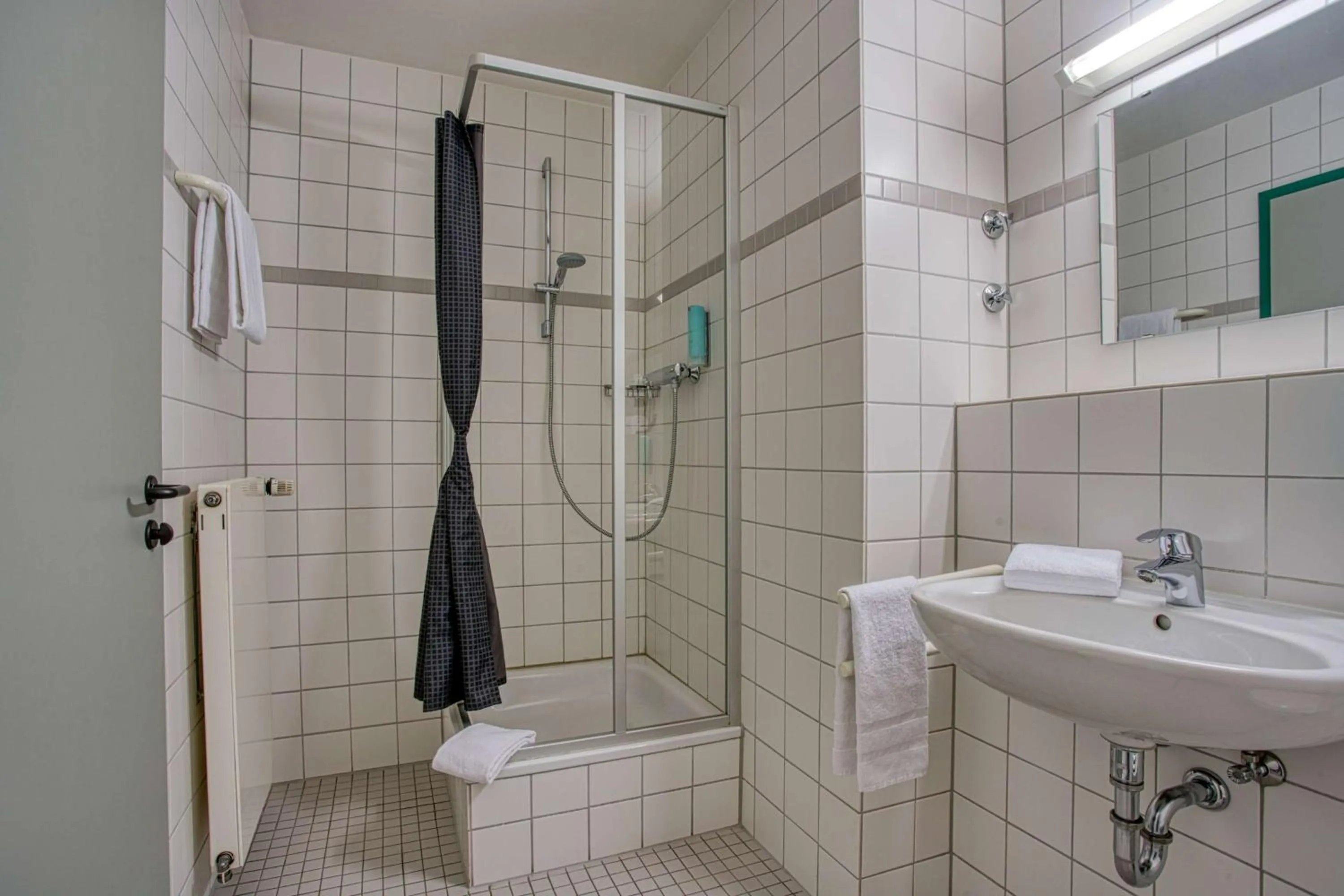 Bathroom in Centro Hotel Böblingen, Trademark Collection by Wyndham