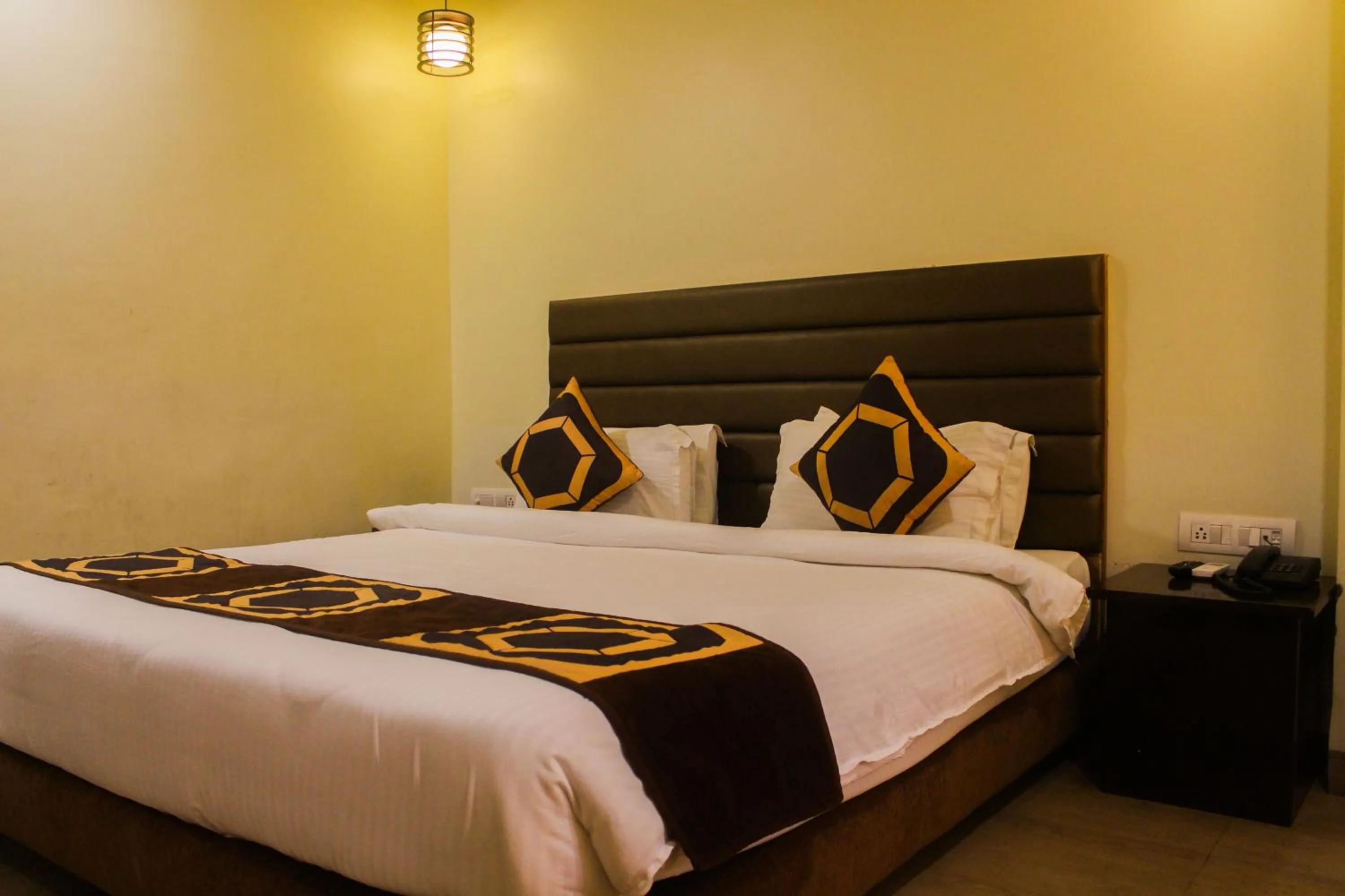 Bed in Solitaire Hotel And Resorts