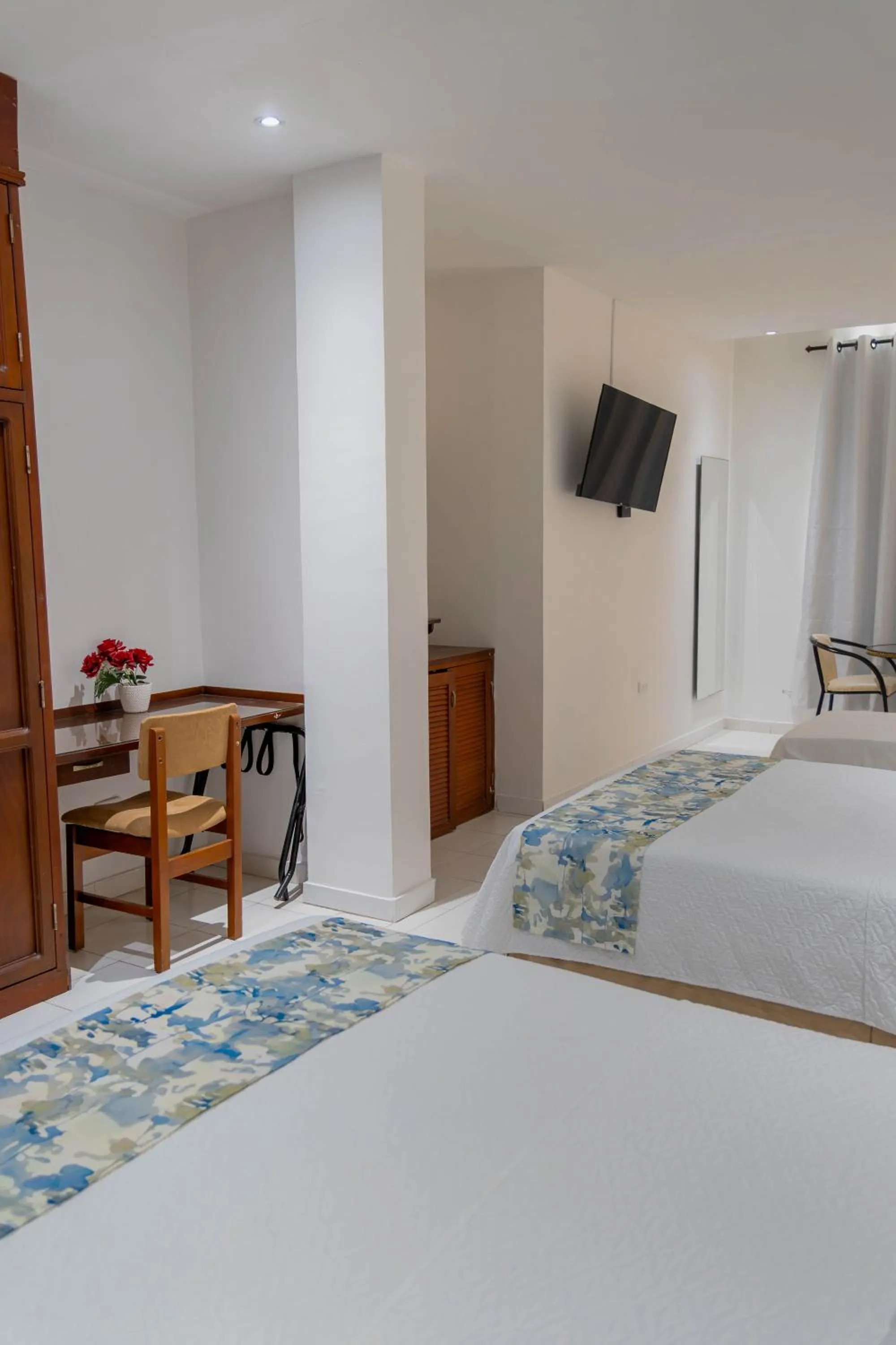 Photo of the whole room, Bed in Hotel Coral Reef Cartagena