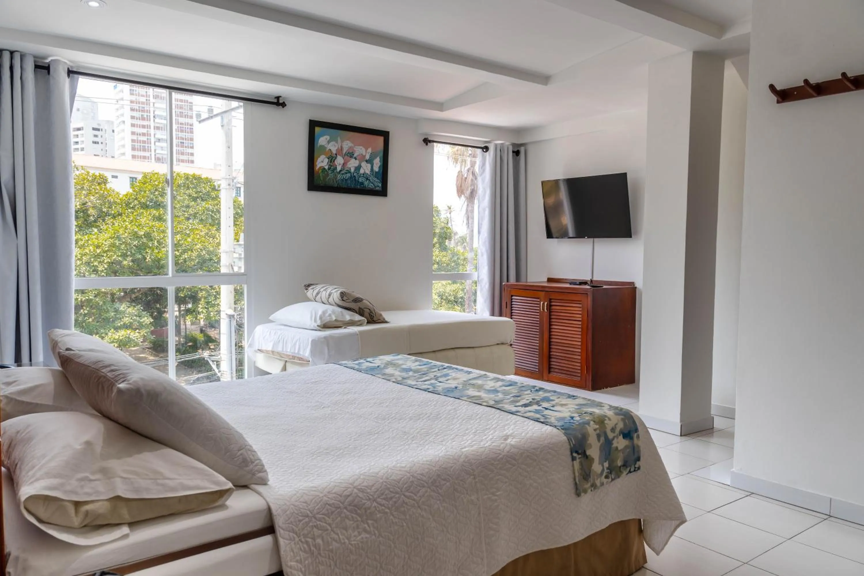 Photo of the whole room, Bed in Hotel Coral Reef Cartagena