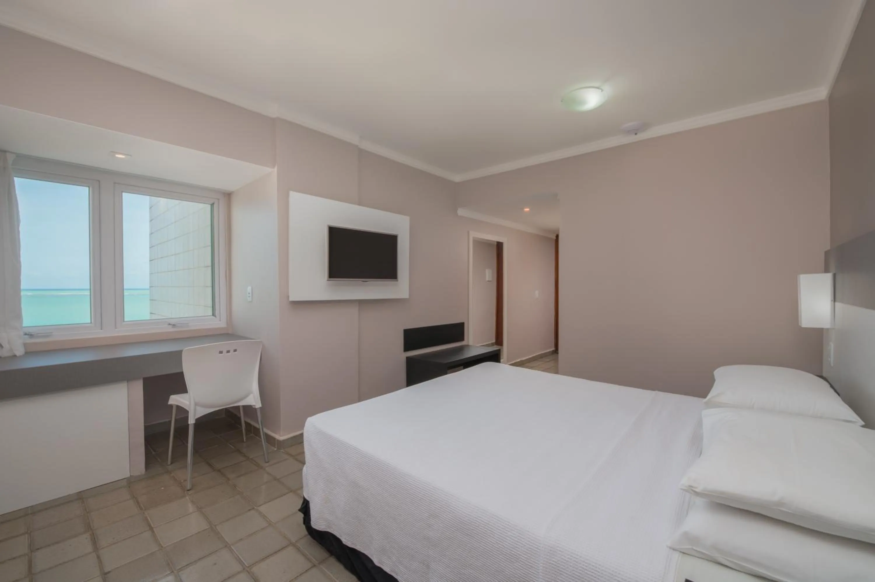 Bed in Hotel Sete Coqueiros