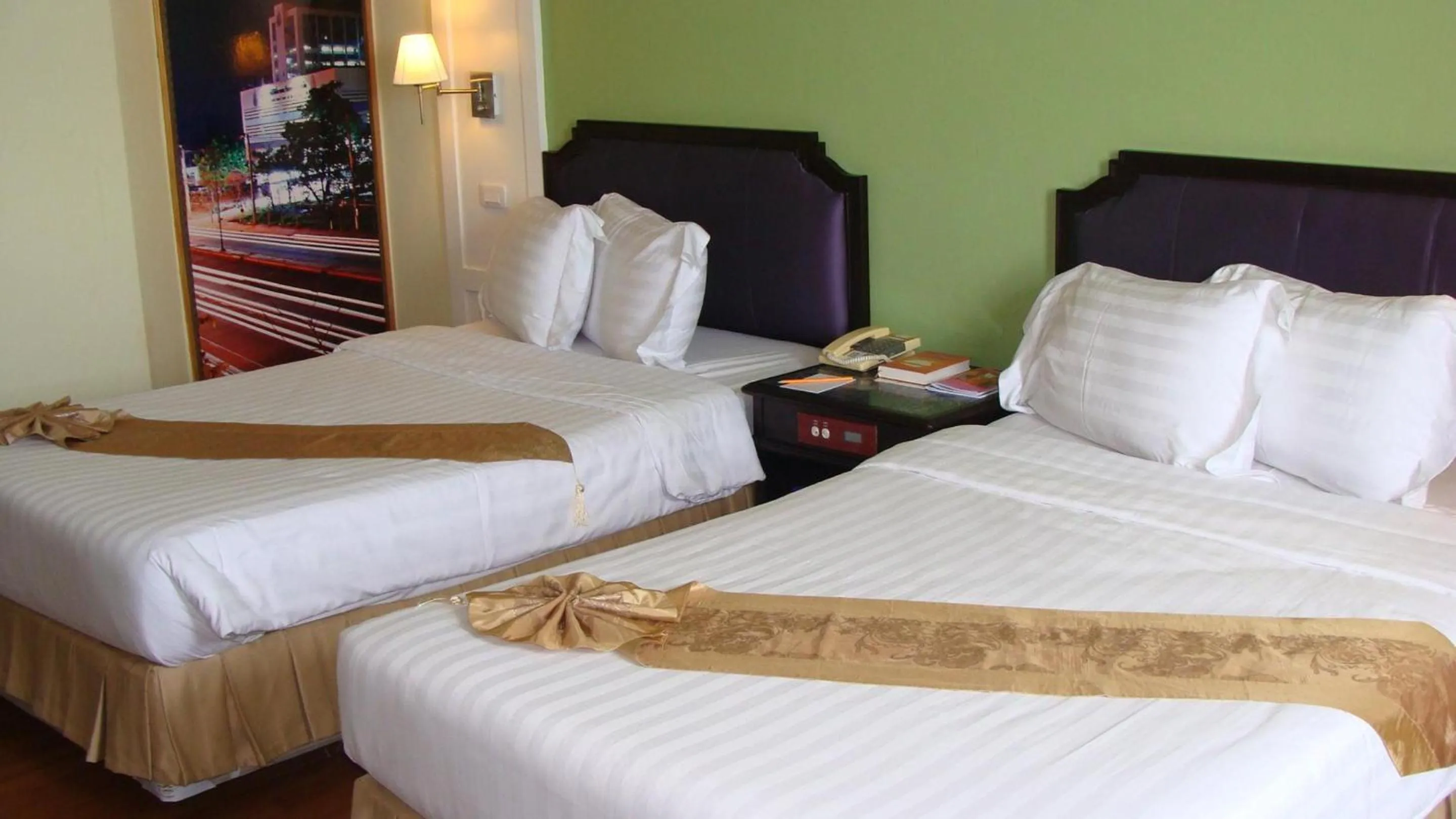 Photo of the whole room, Bed in Charoen Thani Hotel, Khon Kaen