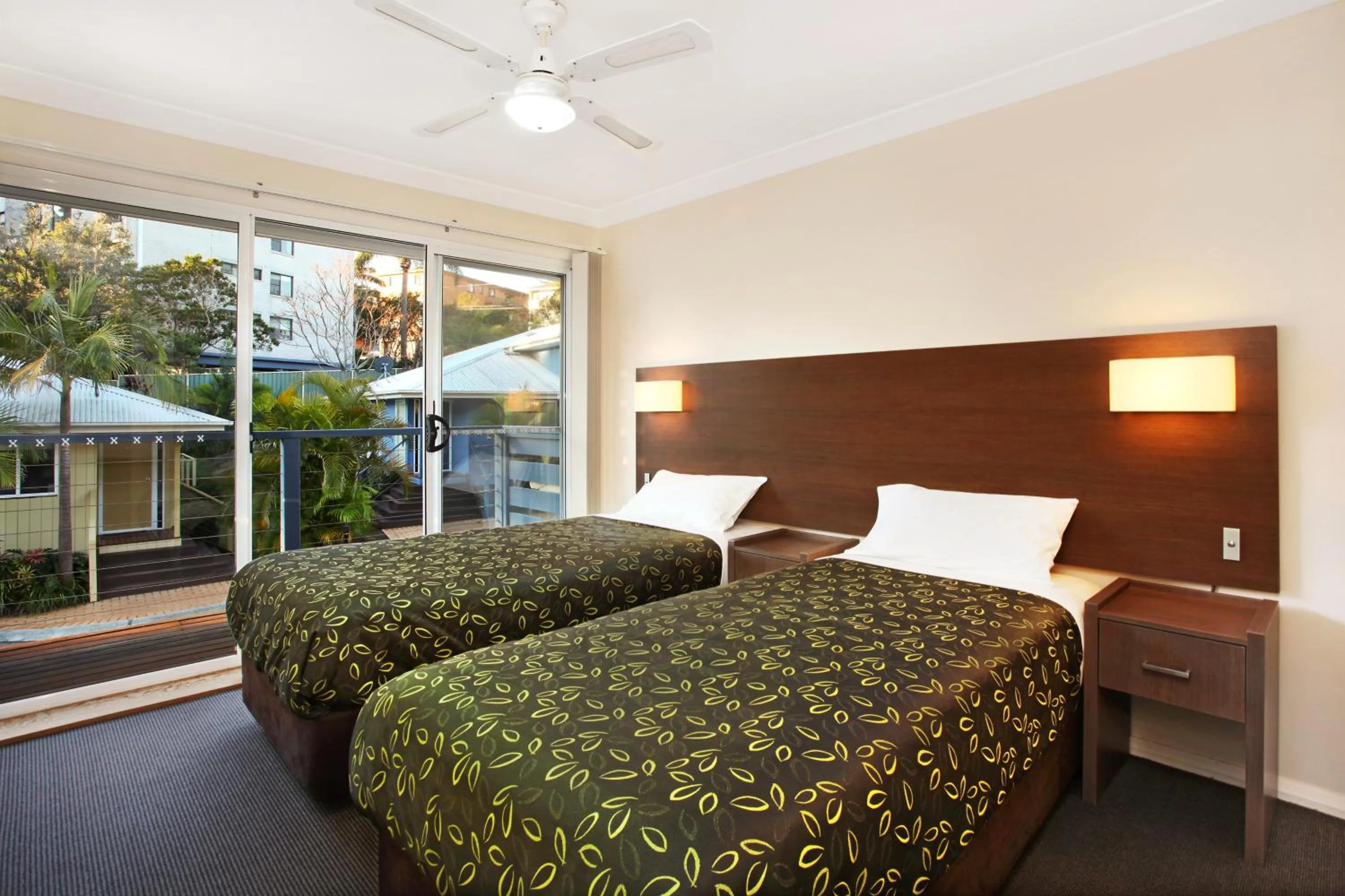 Bed in Flynns on Surf Beach Villas