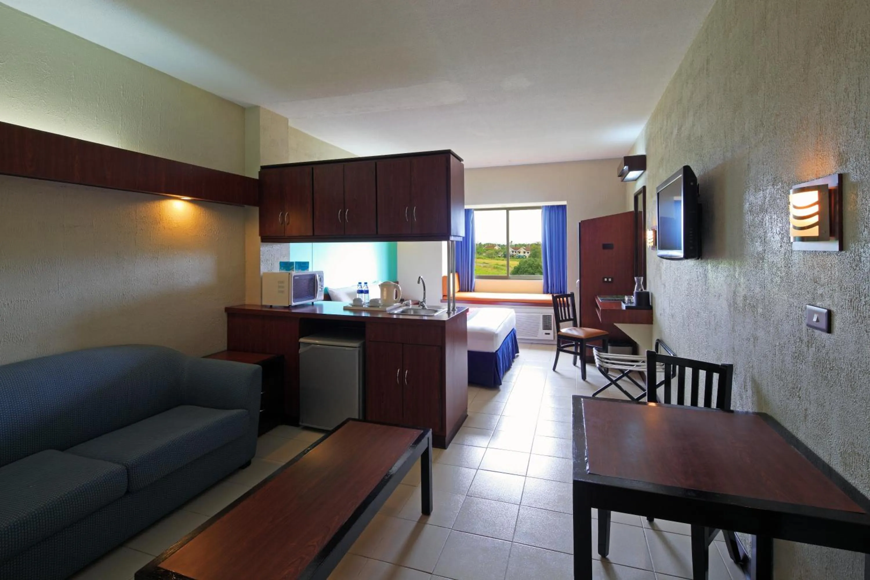 Living room in Microtel by Wyndham Eagle Ridge