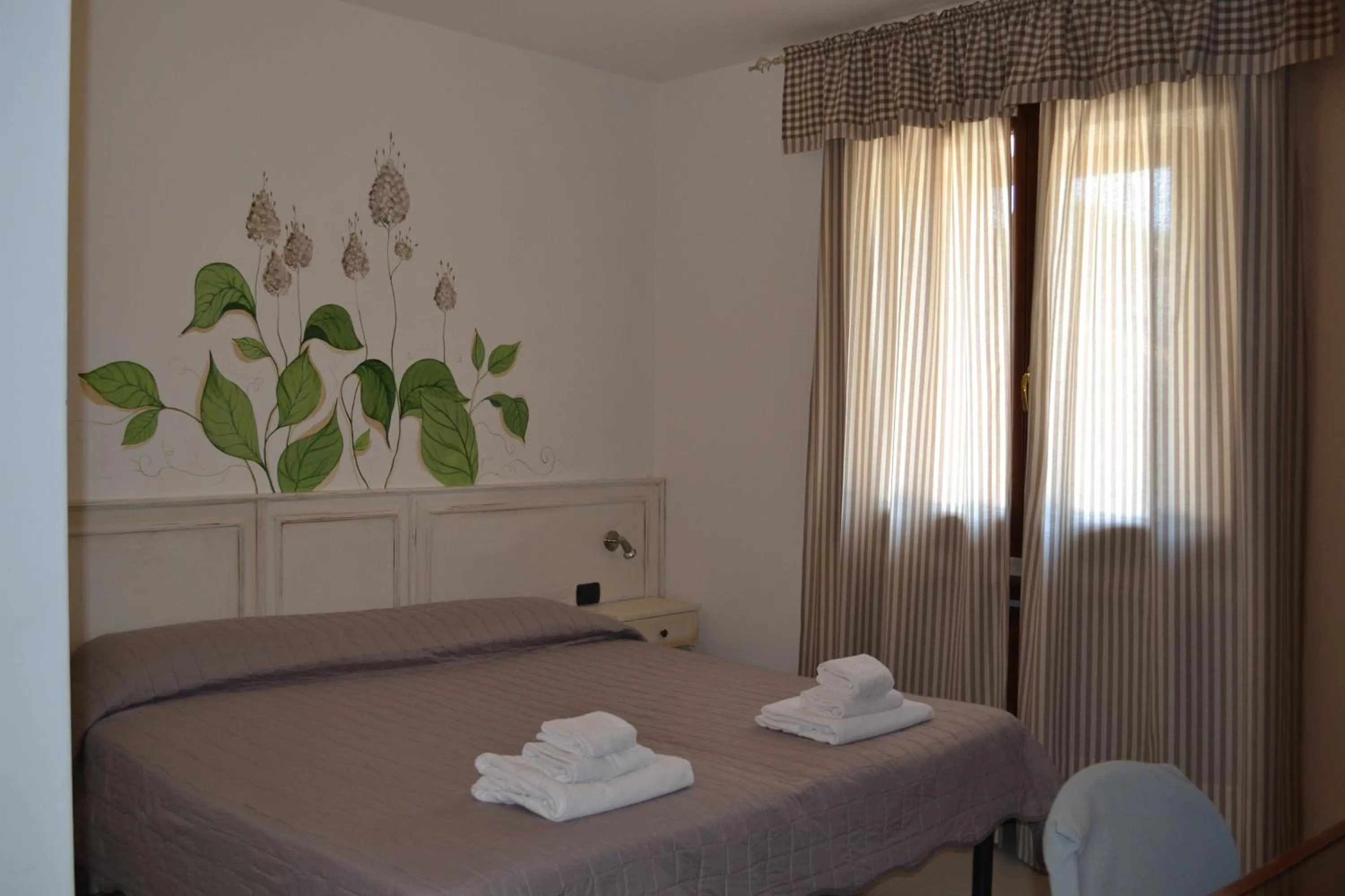 Bed in Albergo Grobberio