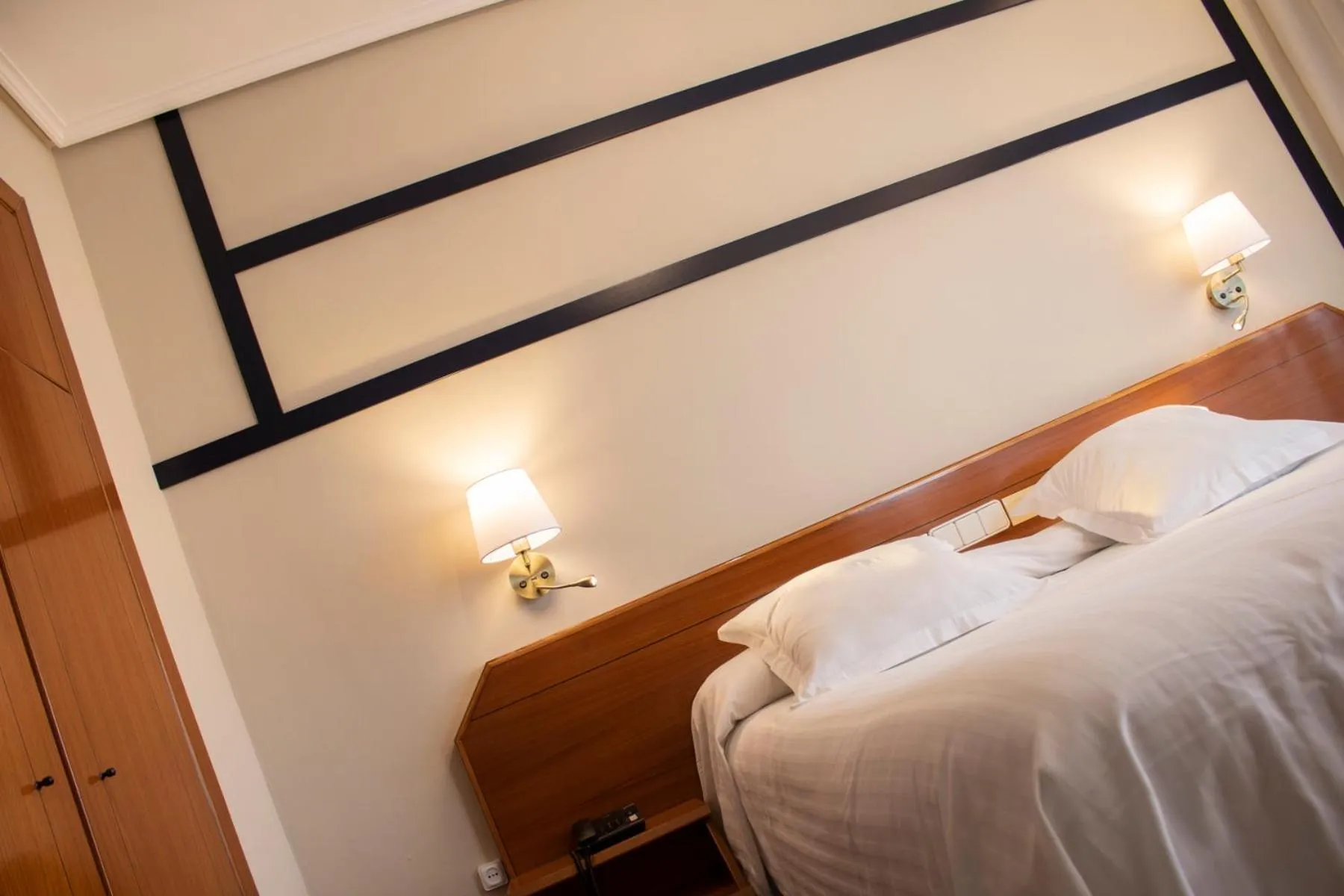 Bed in Hotel Olimpo