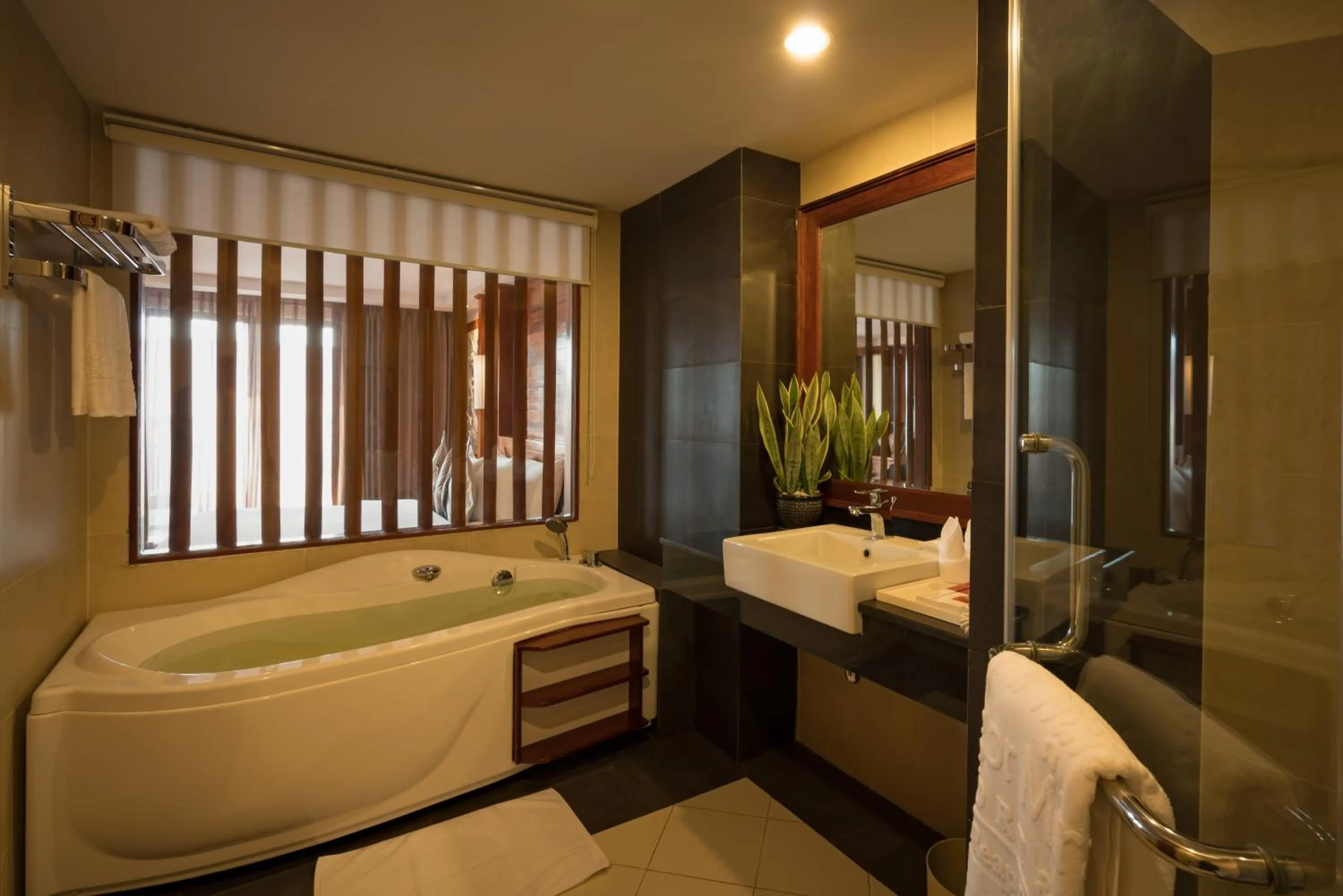 Bathroom, Bed in Angkor Miracle Resort & Spa