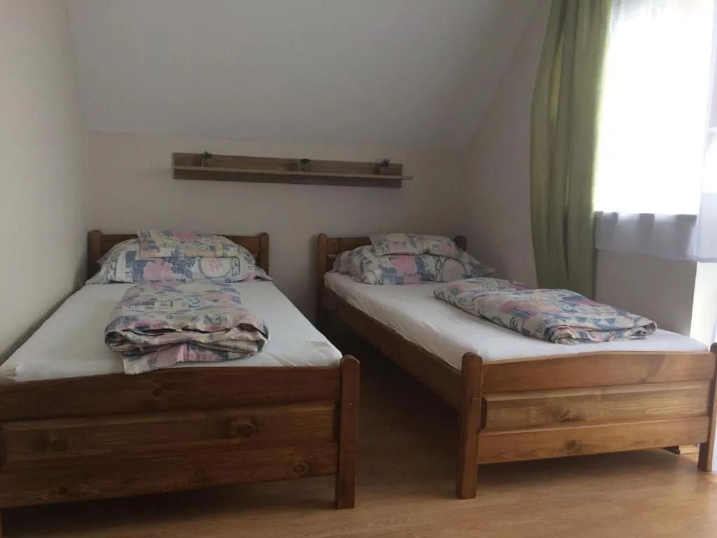 Bedroom, Bed in Szalóky Apartmanház