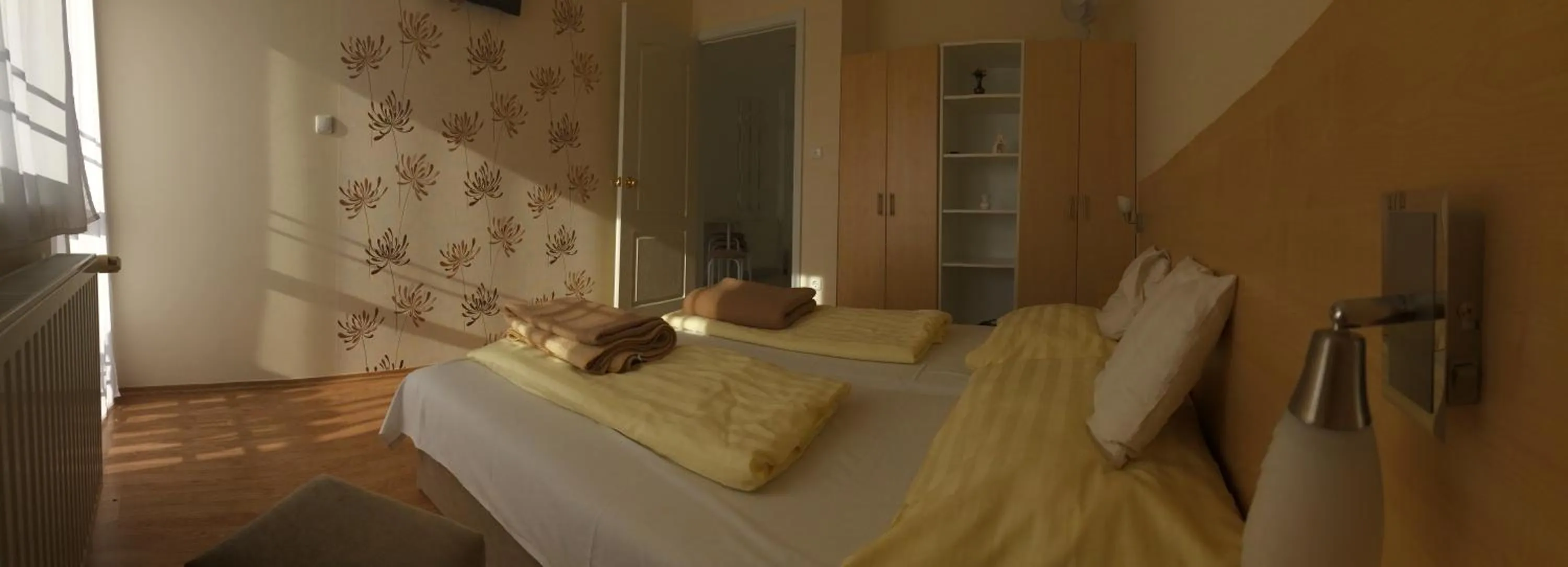 Bedroom in Szalóky Apartmanház