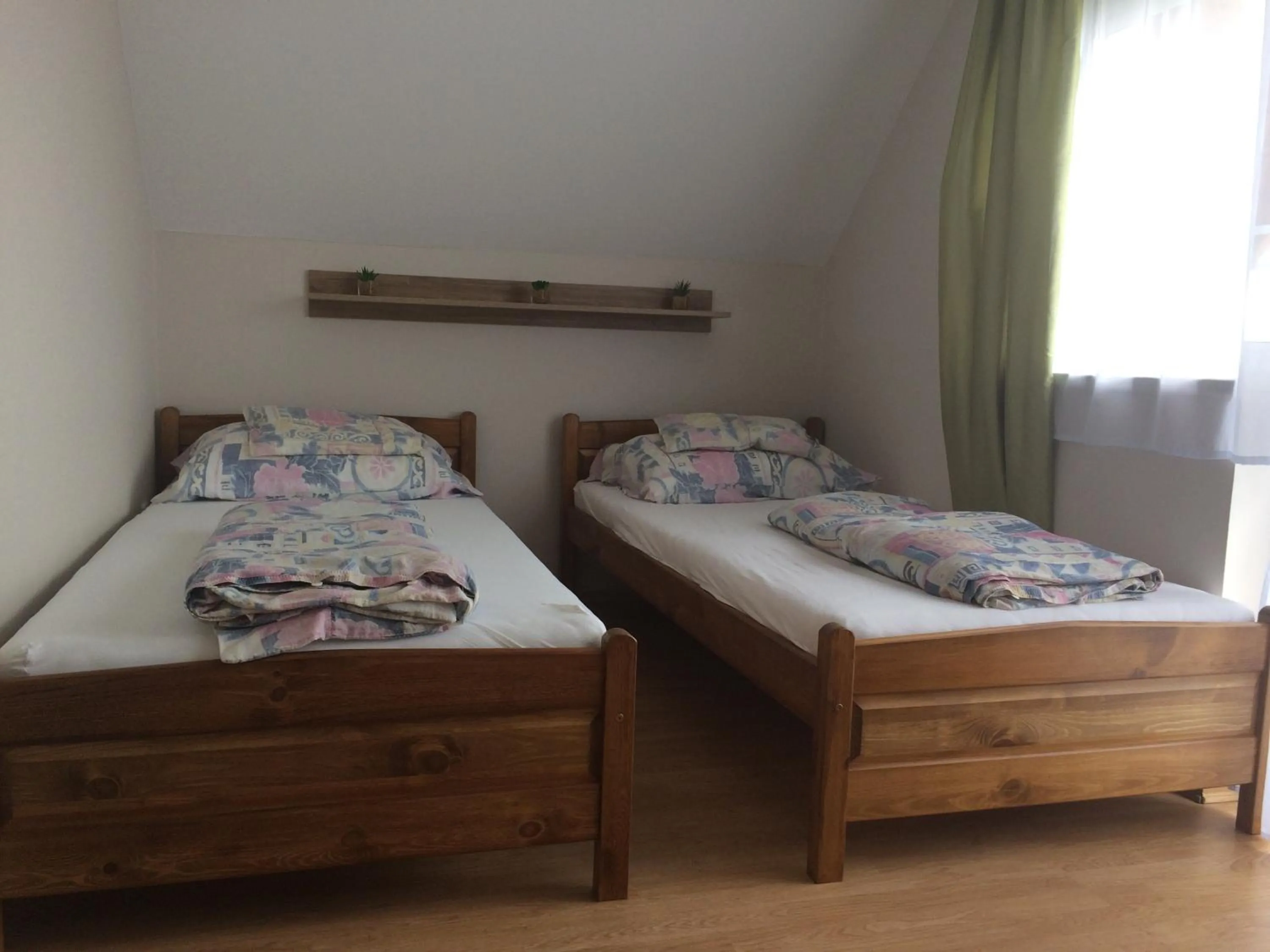 Bedroom, Bed in Szalóky Apartmanház
