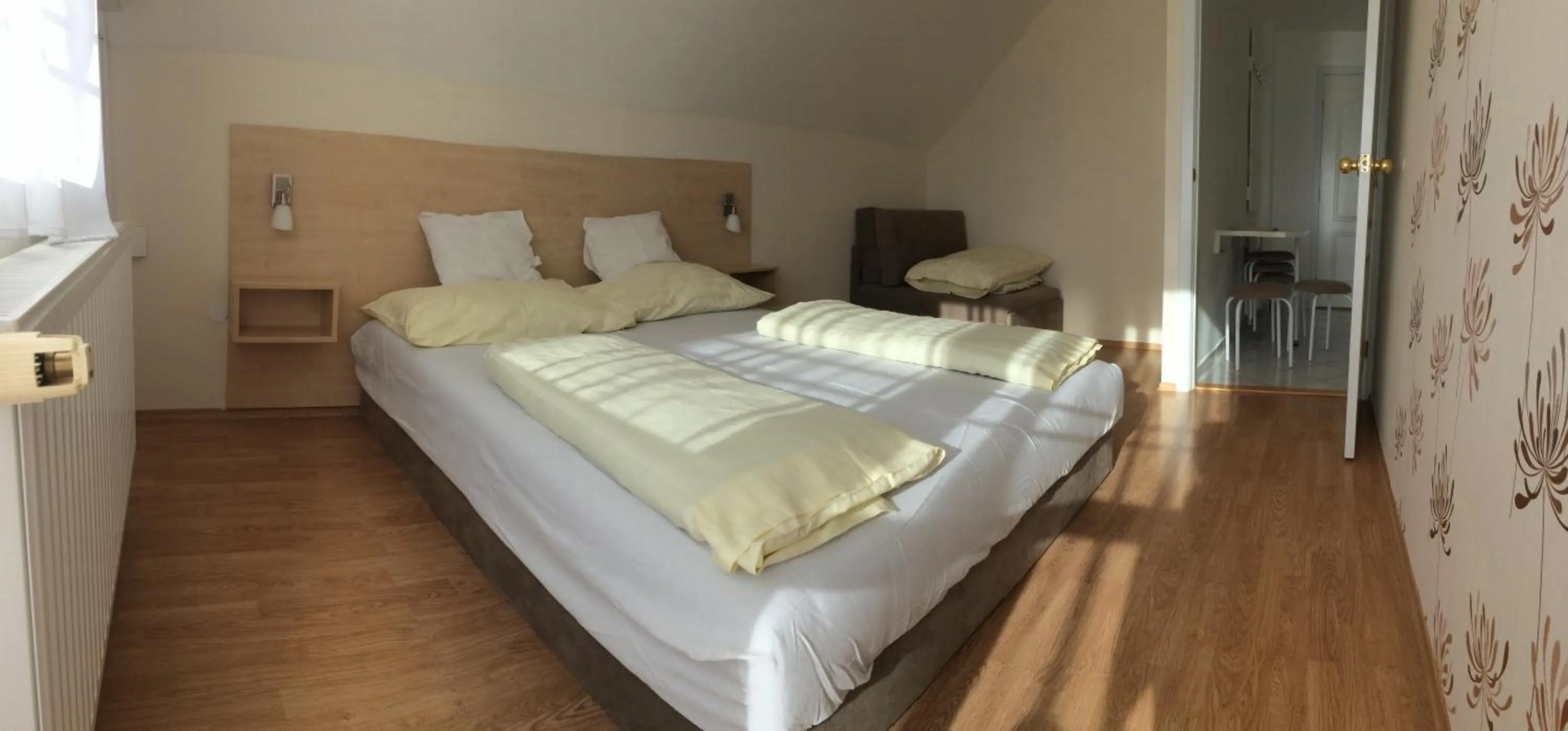 Bed in Szalóky Apartmanház