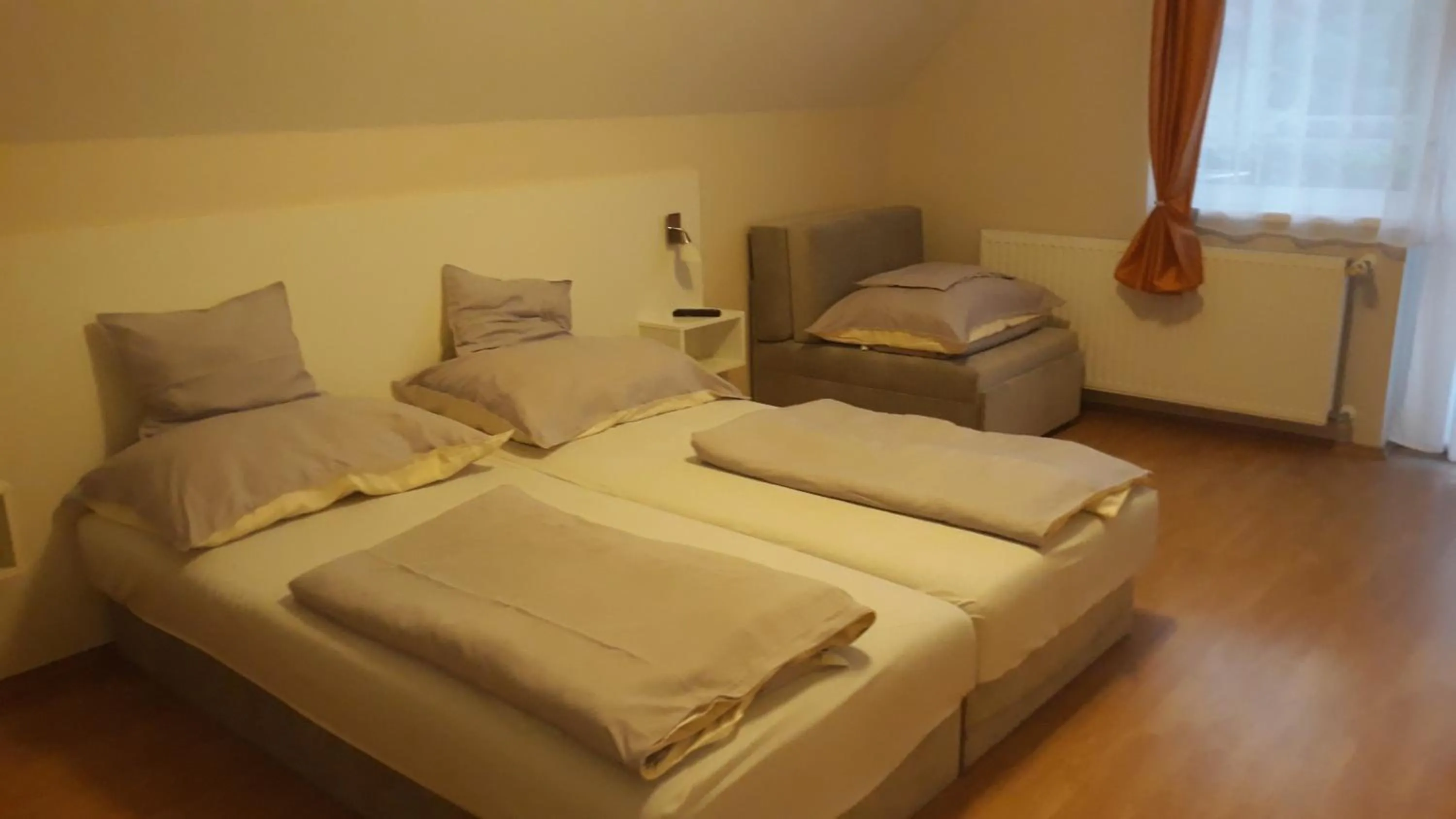 Bed in Szalóky Apartmanház
