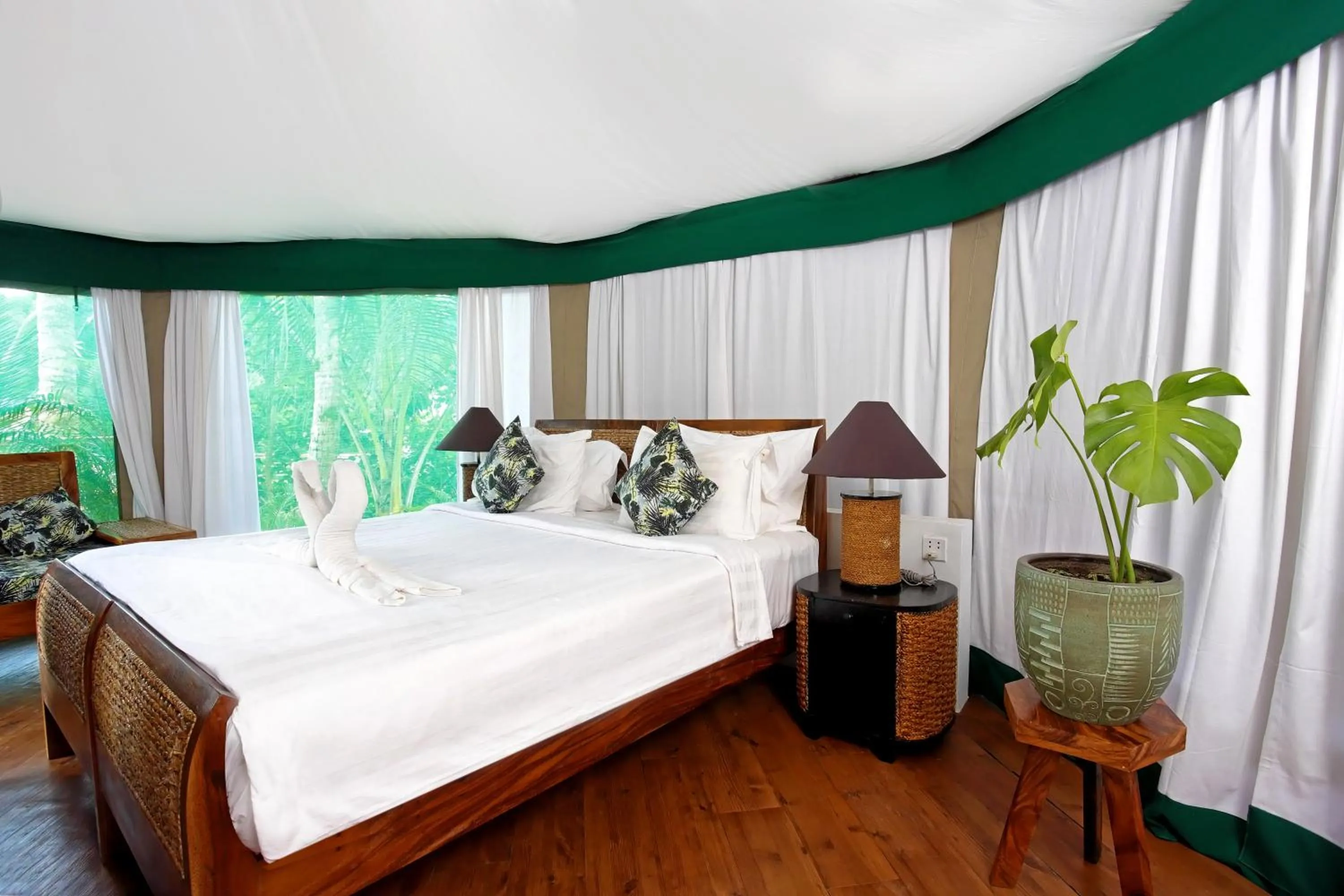 Bed in Canvas & Orchids Retreat