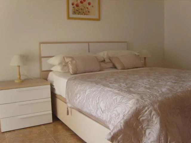 Bed in Playamarina 1 Reception