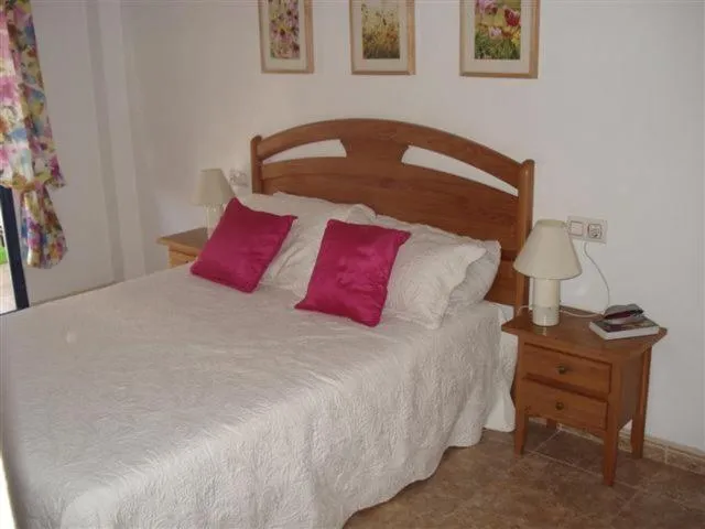 Bed in Playamarina 1 Reception