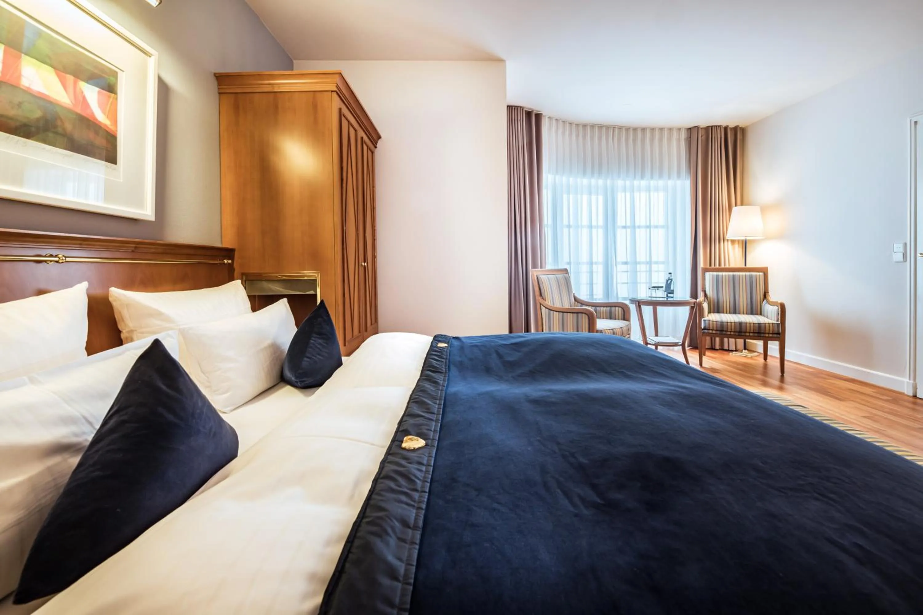 Bed in Romantik Hotel Kleber Post