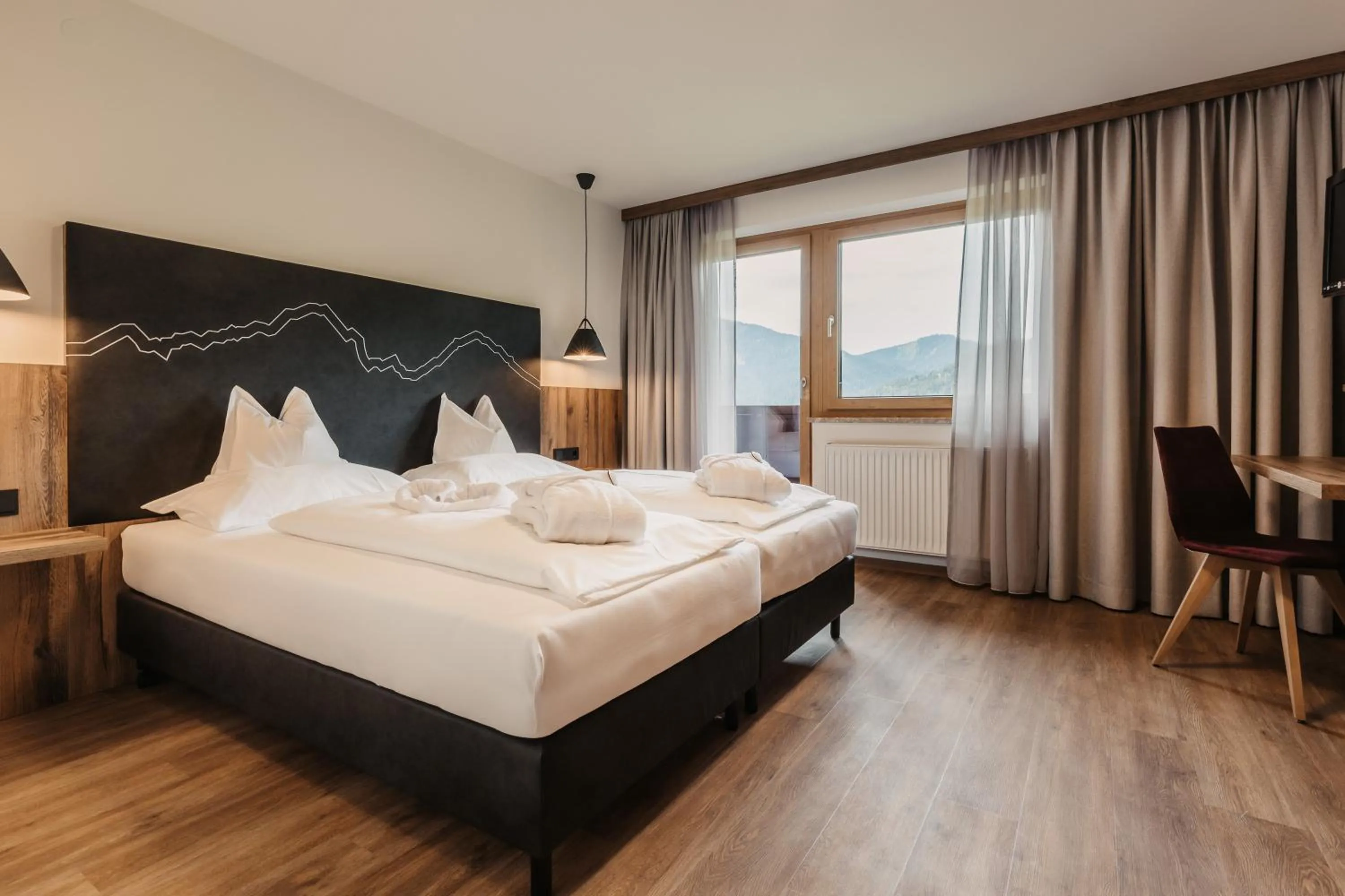 Photo of the whole room, Bed in Hotel Neubergerhof