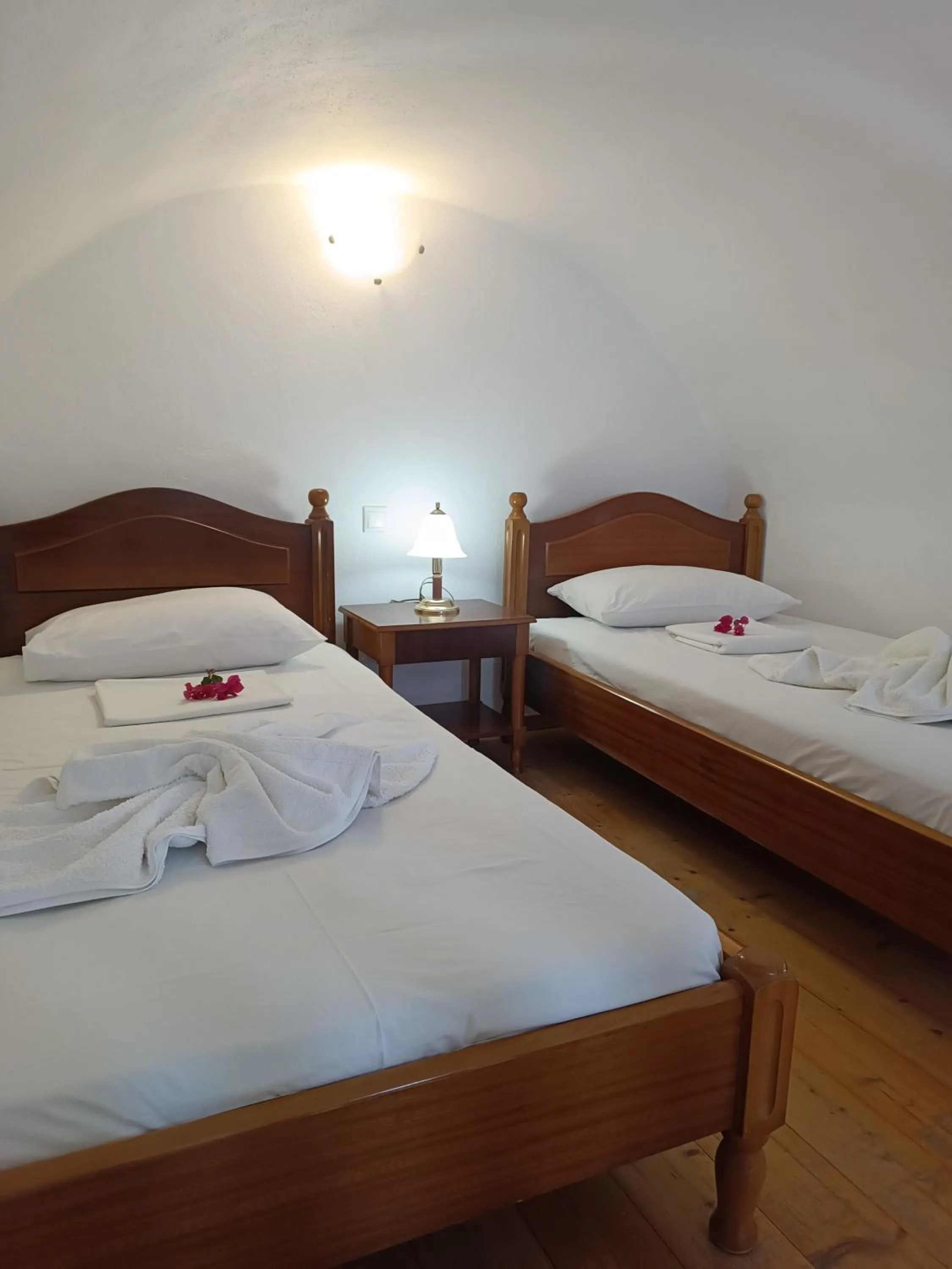 Bed in Ifestia Hotel