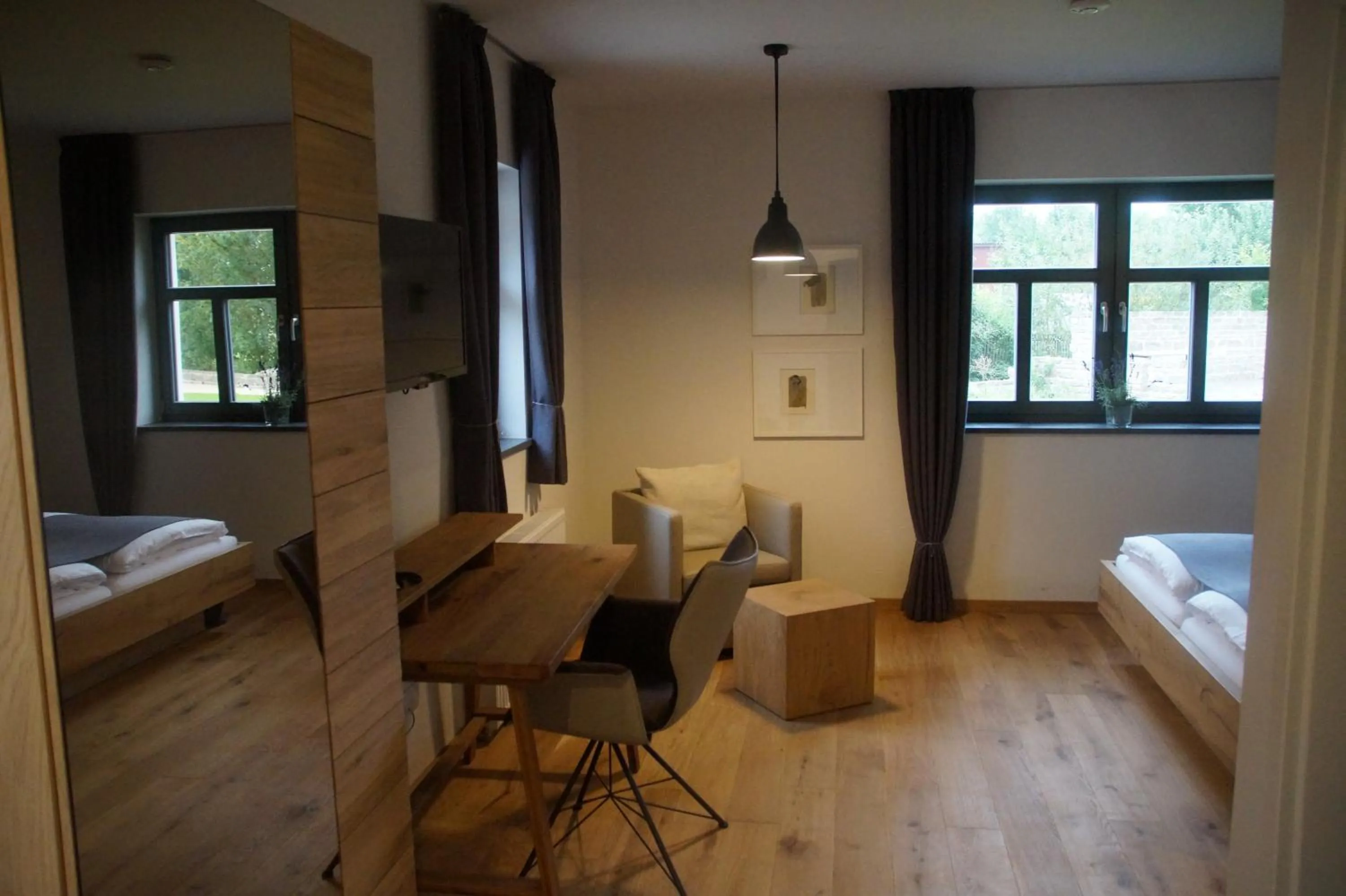 Photo of the whole room, Bed in Hotel Dorfmühle